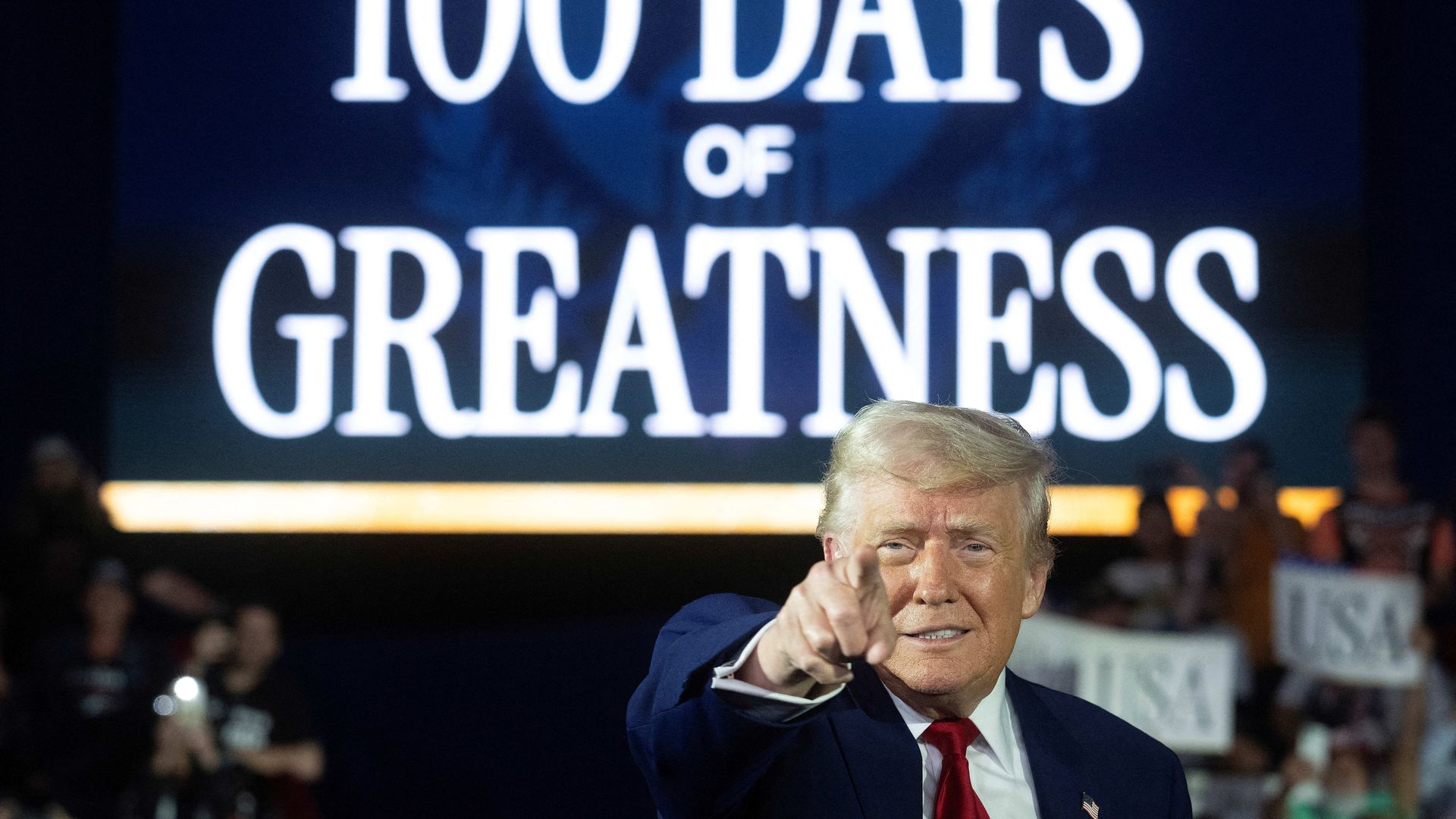 President Donald Trump arrives to deliver a speech marking his 100th day in office at Macomb County Community College Sports Expo Center in Warren, Michigan, on April 29, 2025.