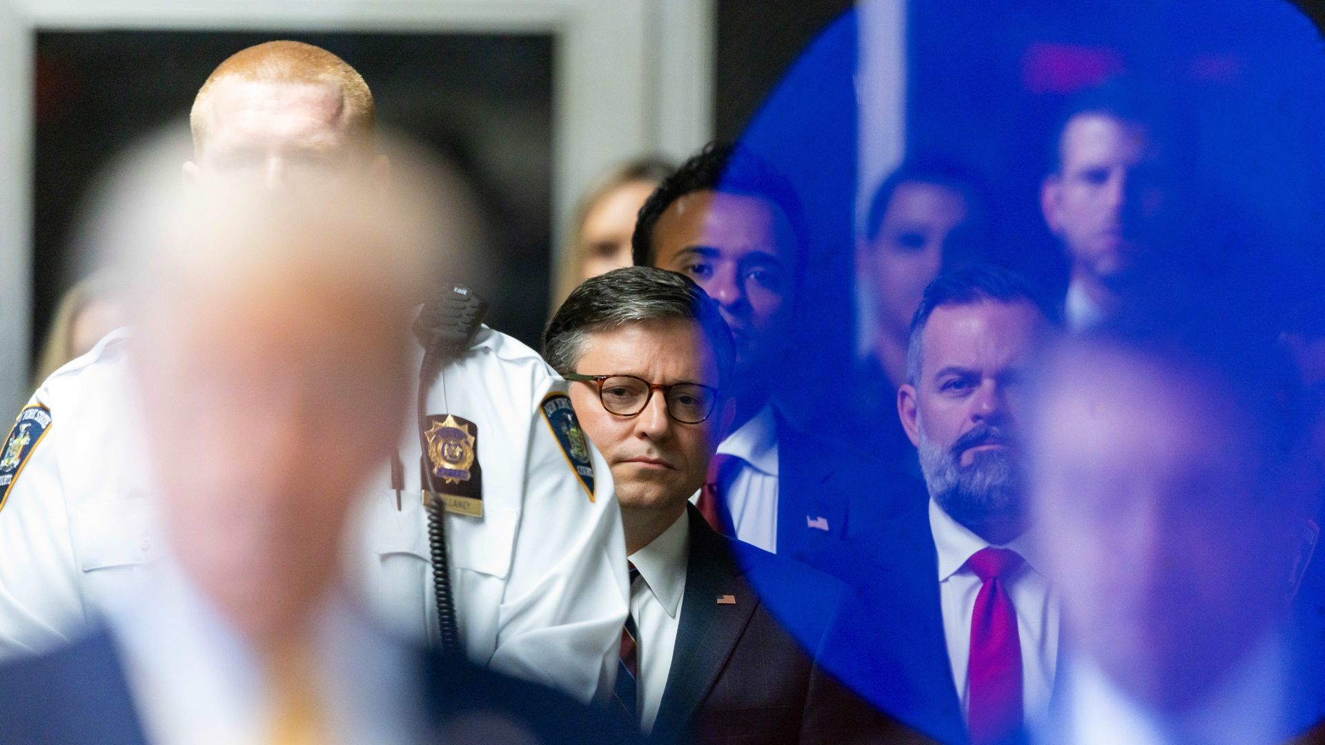 Mike Johnson, Vivek Ramaswamy with Trump in foreground