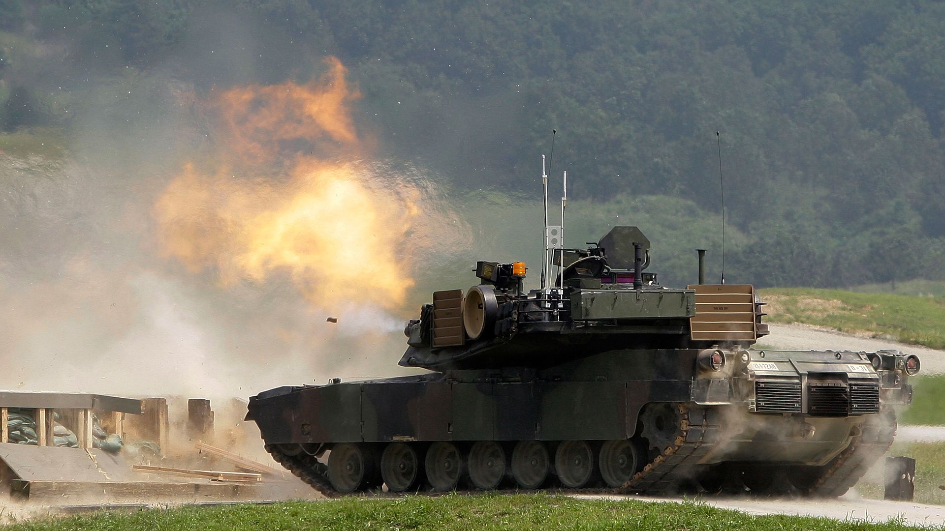A U.S. M1A2 SEP Abrams battle tank fires live rounds during the United States and South Korean Joint live fire Exercise at Rodriguez Range on September 1, 2011.