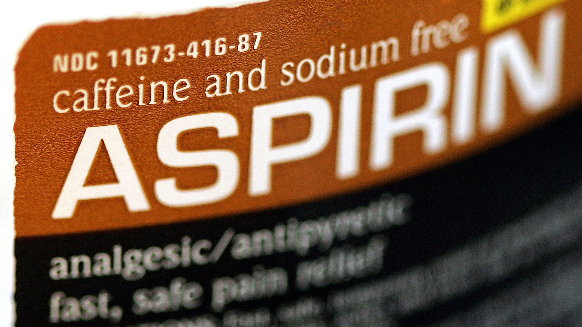 A close-up label of a generic aspirin bottle. Photo: Tim Boyle/Getty Images