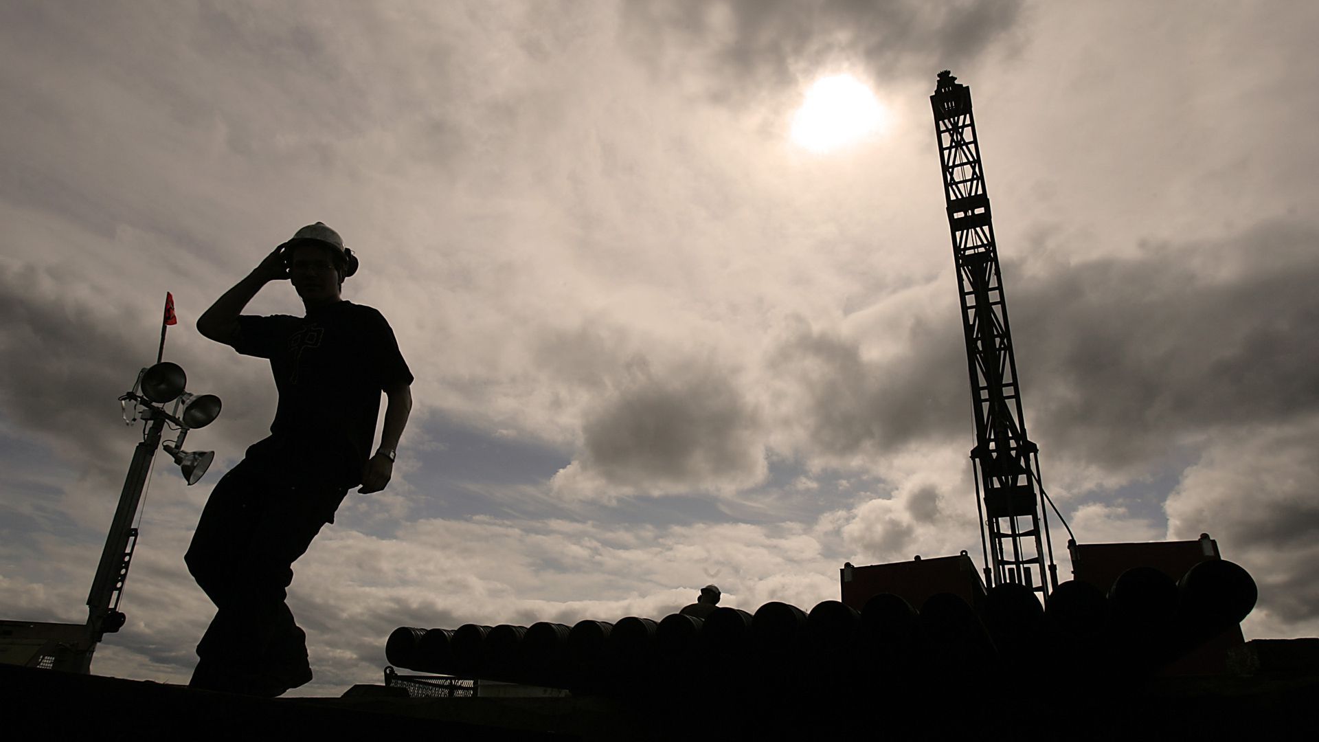 An employee of Northen Dynasty Mines Inc. mans a drilling rig in the Pebble Mine East site near the village of Iliamna, Alaska