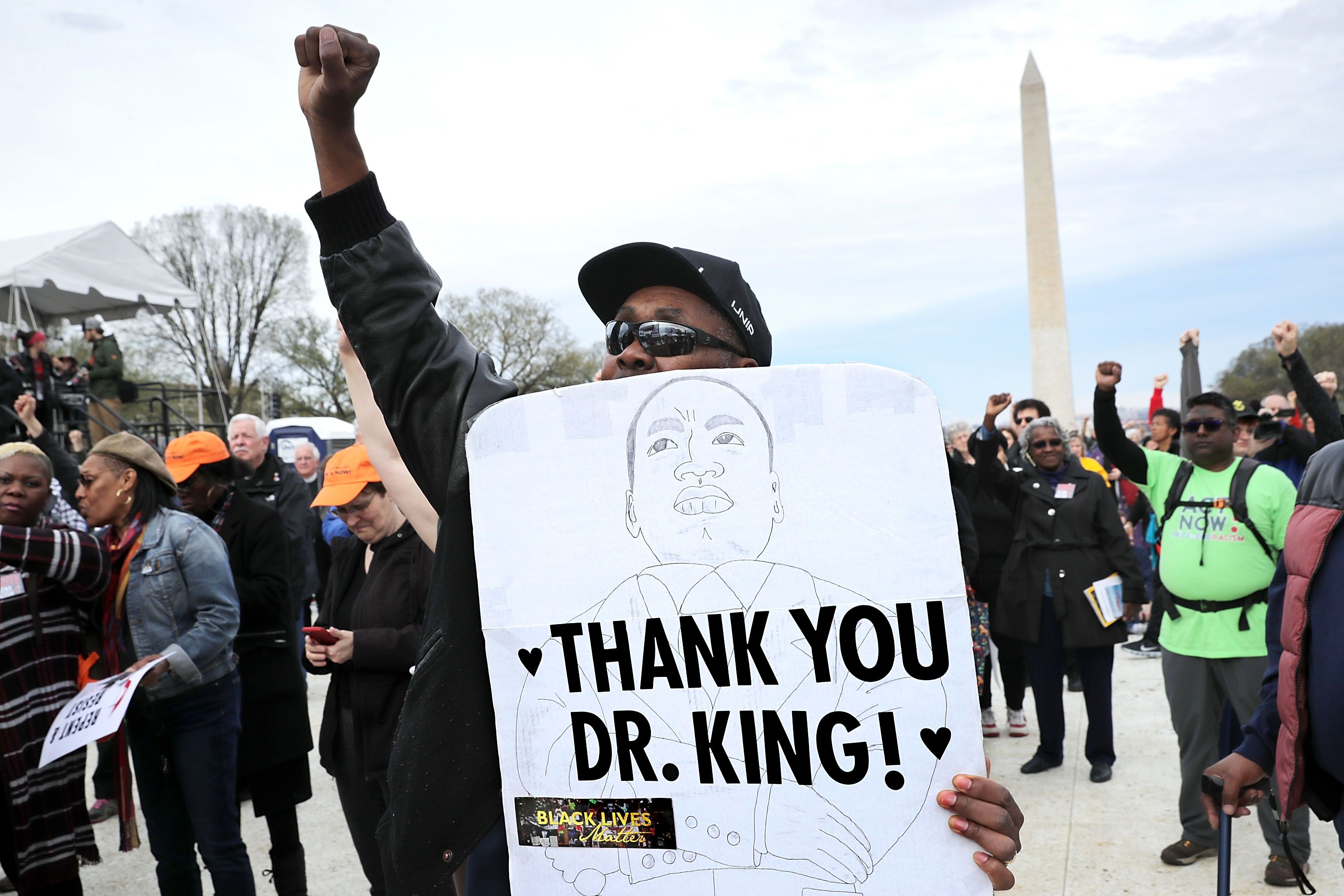Thousands gather on the National Mall for a prayer rally to mark the 50th anniversary of Dr. Martin Luther King Jr.'s assassination