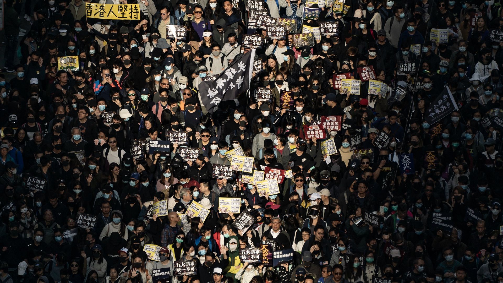 Pro-democracy protesters march in Hong Kong