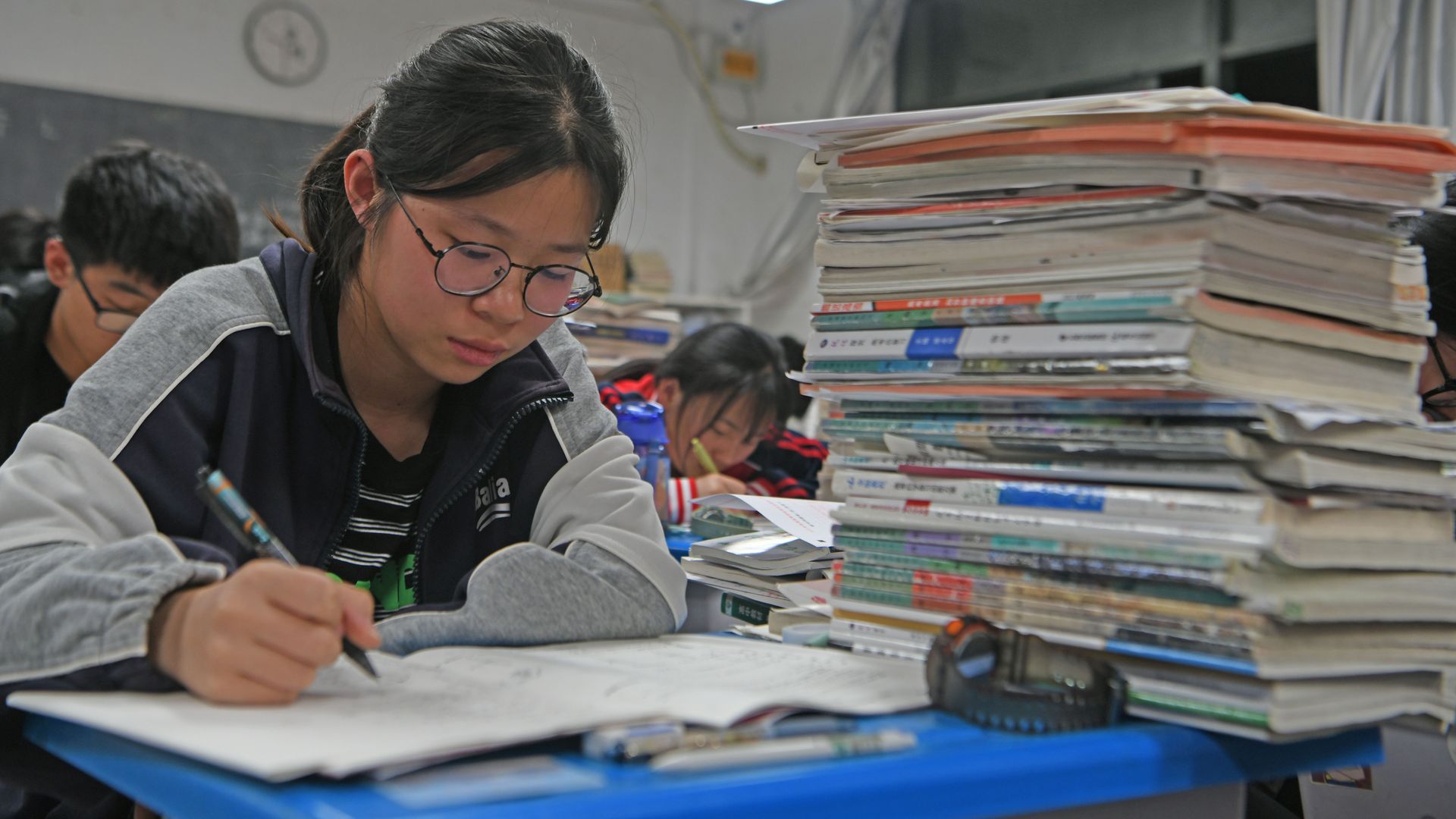 A senior three student studies in the classroom at night for the upcoming national college entrance exam on May 22, 2023 in Huainan, Anhui Province of China. 