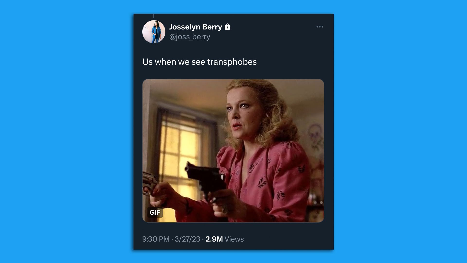 A screenshot of a tweet featuring an image of a women with two handguns and the words "Us when we see transphobes."