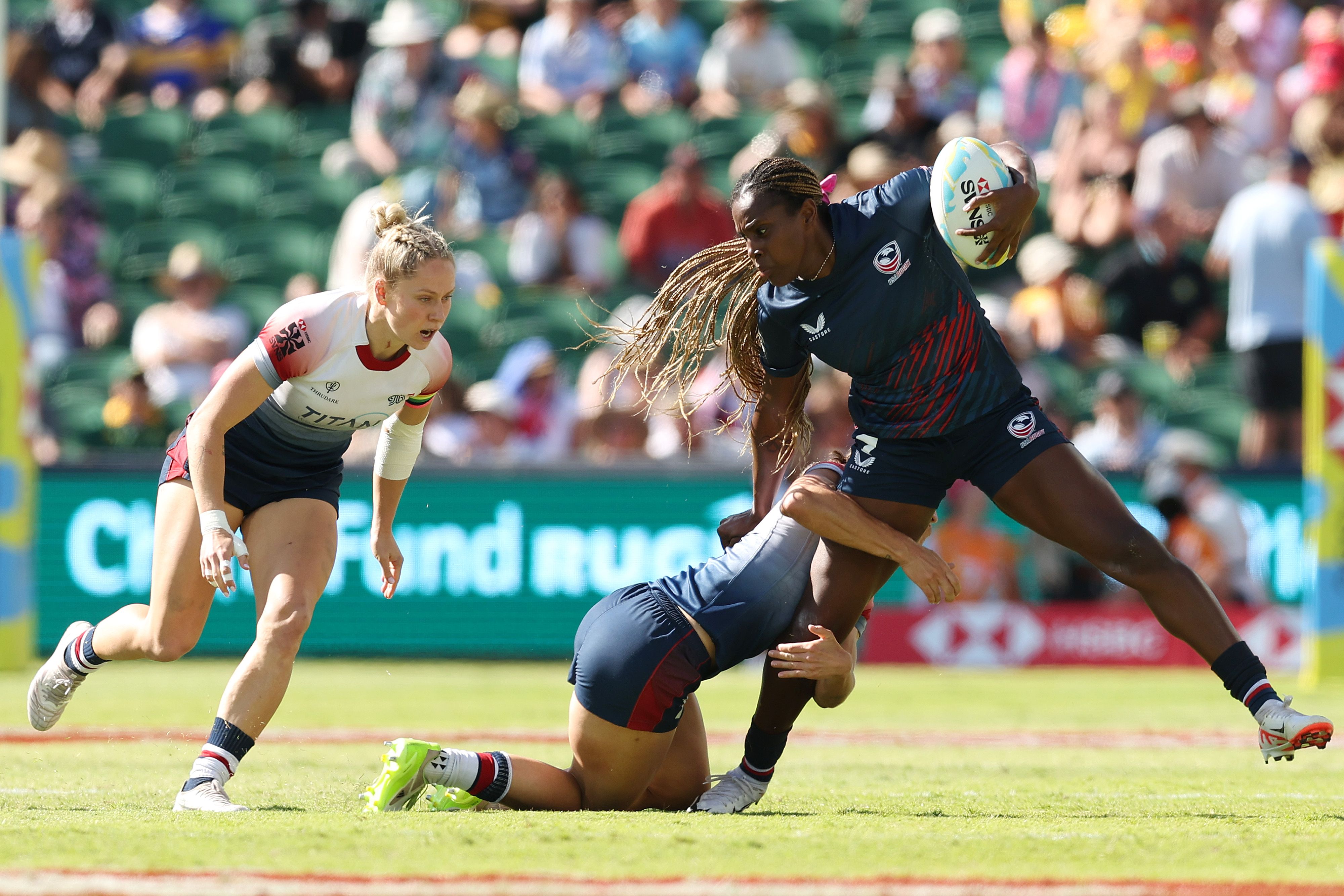 Naya Tapper playing rugby. 