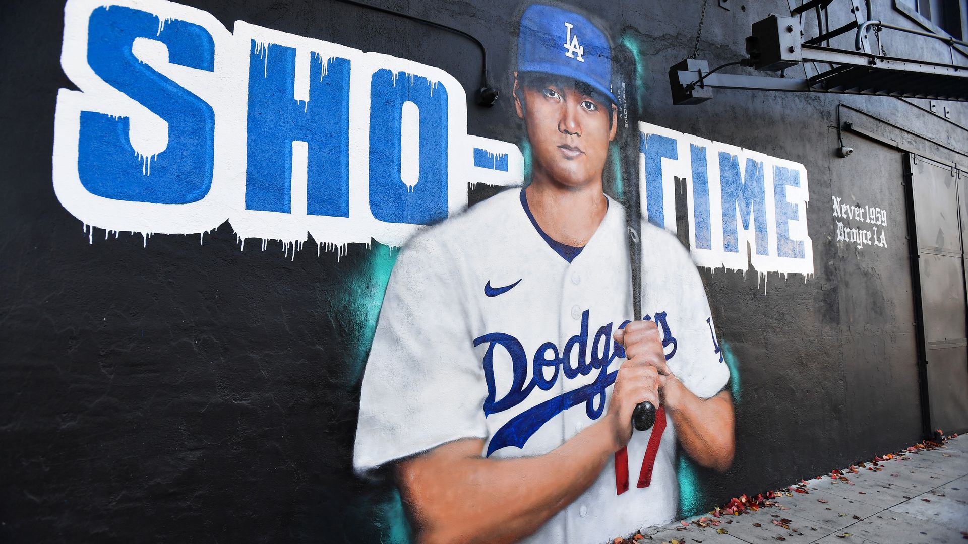 A mural showing a baseball player holding a bat