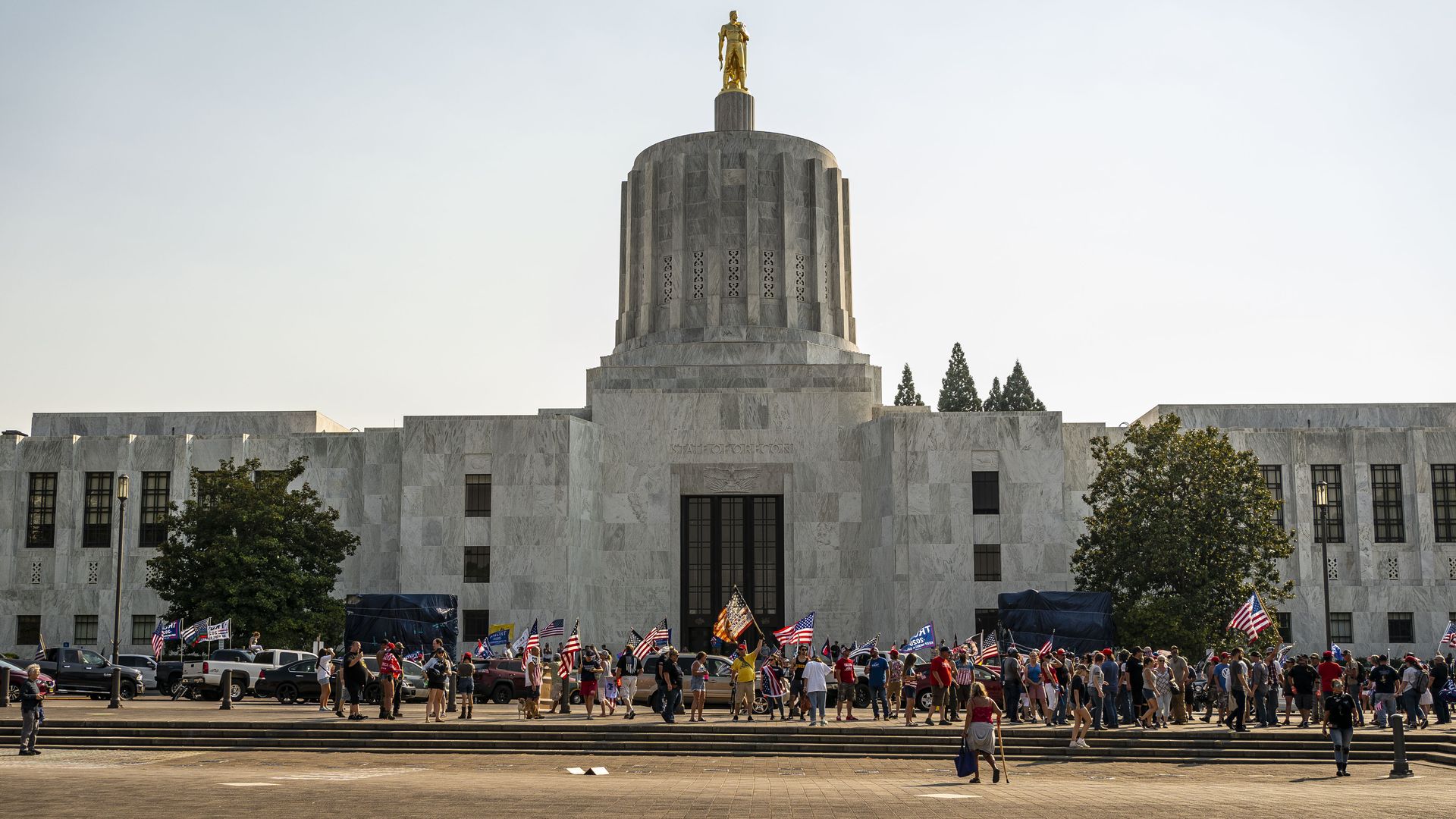 Demonstrators gather as a pro-Trump caravan rally convenes at the Oregon State Capitol building on September 7, 2020 in Salem, Oregon.