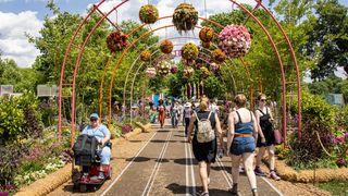 People walking through the Philadelphia Flower Show