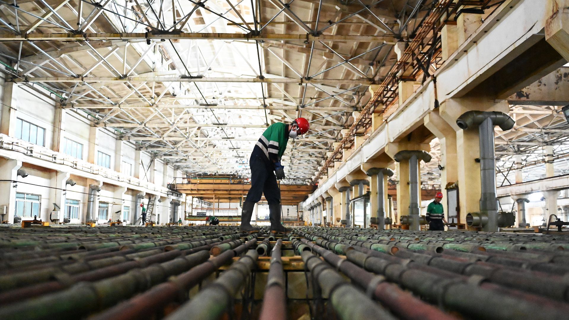 Employees work at a nickel electrolysis workshop of Jinchuan Group Co., Ltd, in China