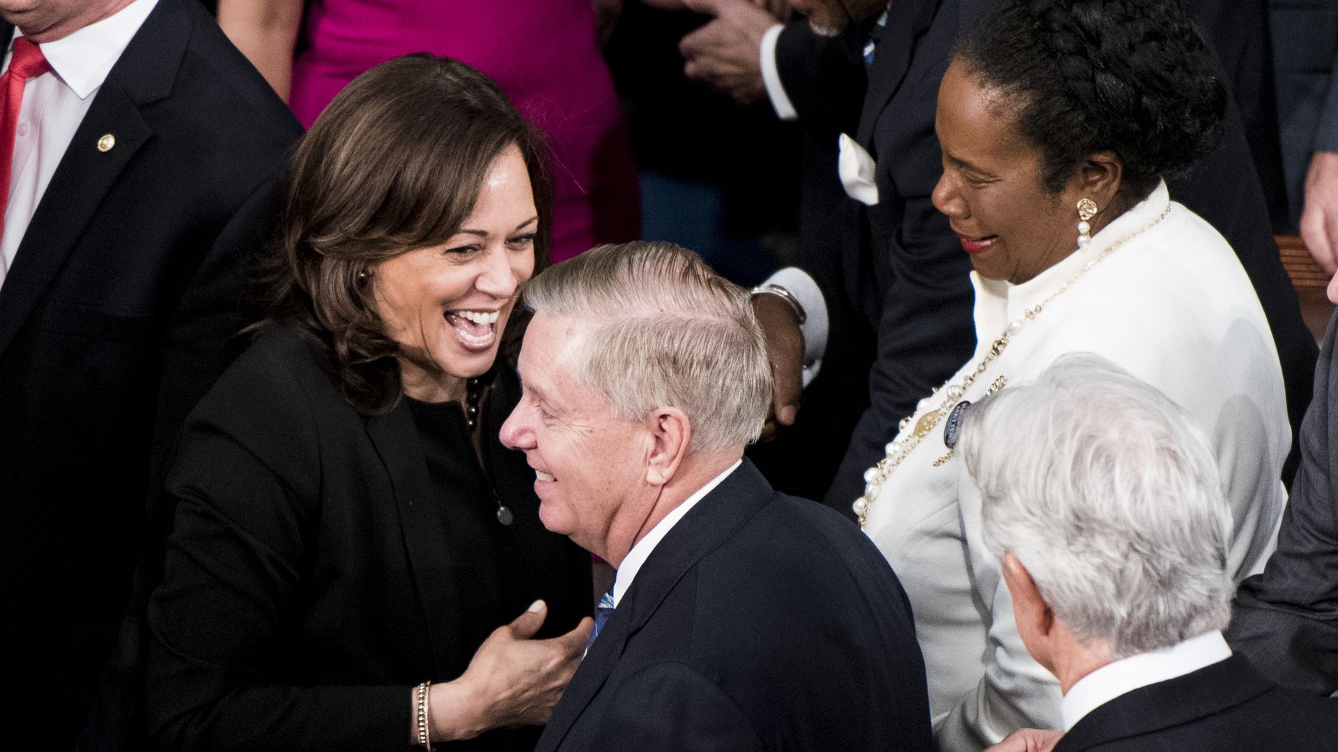Sen. Kamala Harris, D-Calif., and Sen. Lindsey Graham, R-S.C., arrive for President Donald Trump's State of the Union Address to a joint session of Congress in the Capitol on Tuesday, Feb. 5.