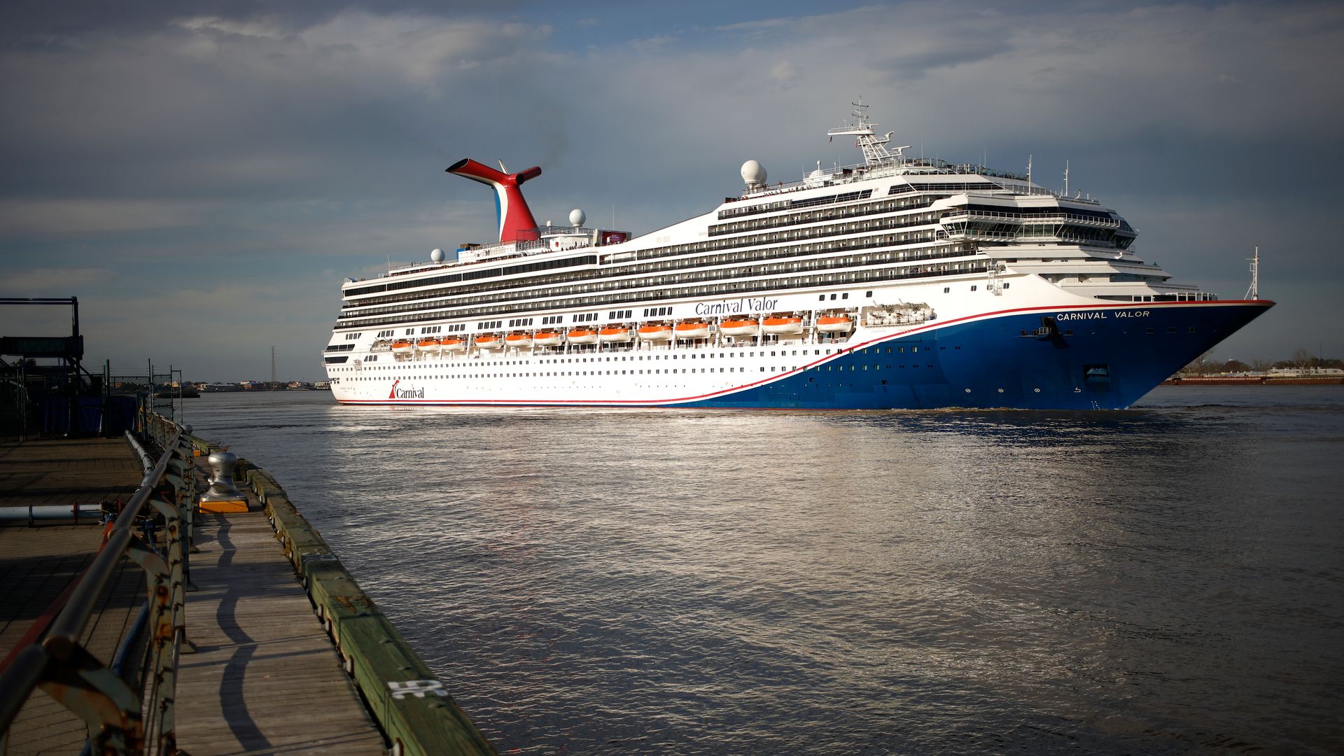 Image shows a cruise ship in the water.