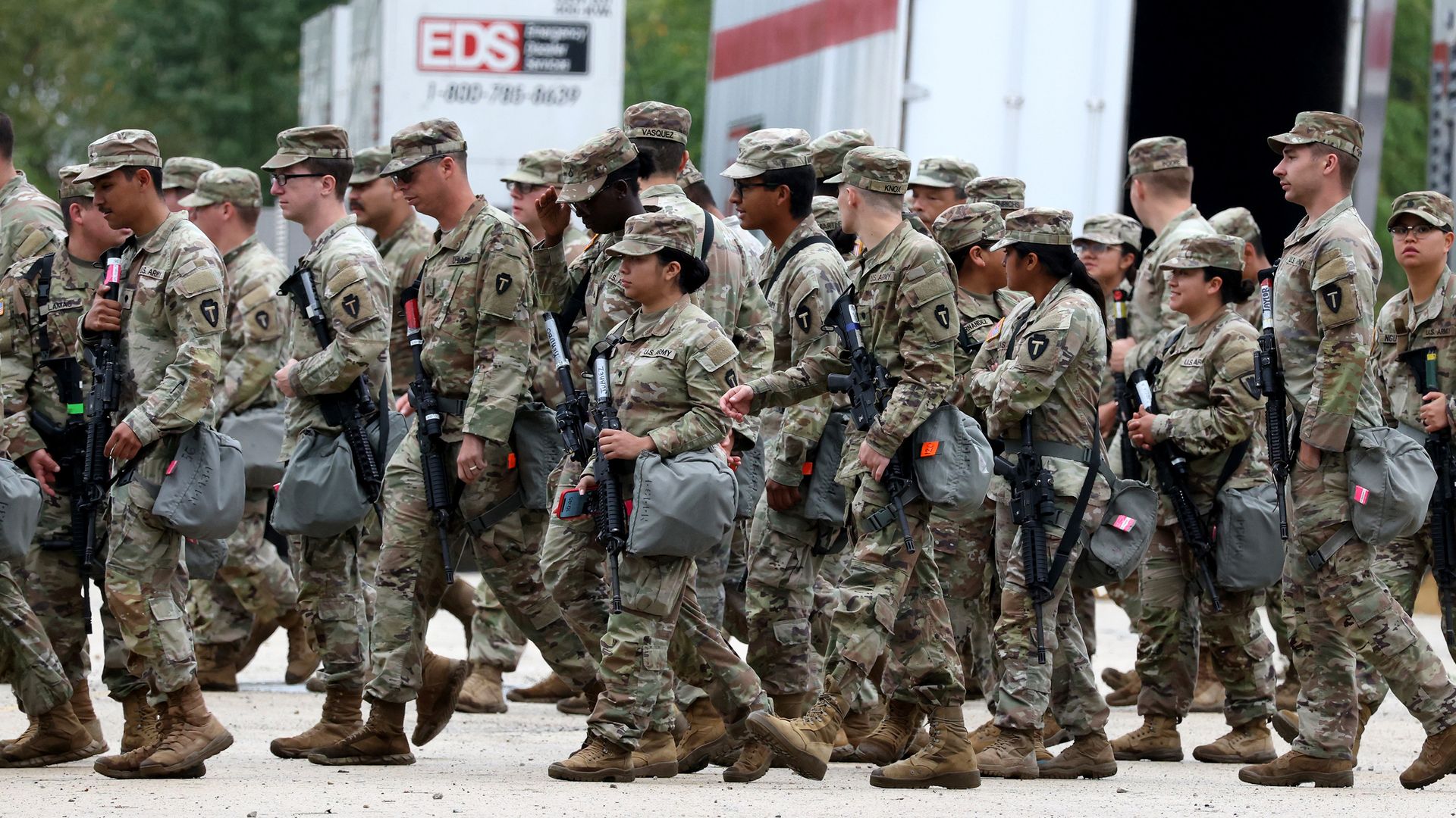 Members of the Texas National Guard assemble in Elwood, Illinois, at the Army Reserve Training Center in the southwest suburb of Chicago, on Tuesday, Oct. 7. 2025. (Brian Cassella/Chicago Tribune/Tribune News Service via Getty Images)
