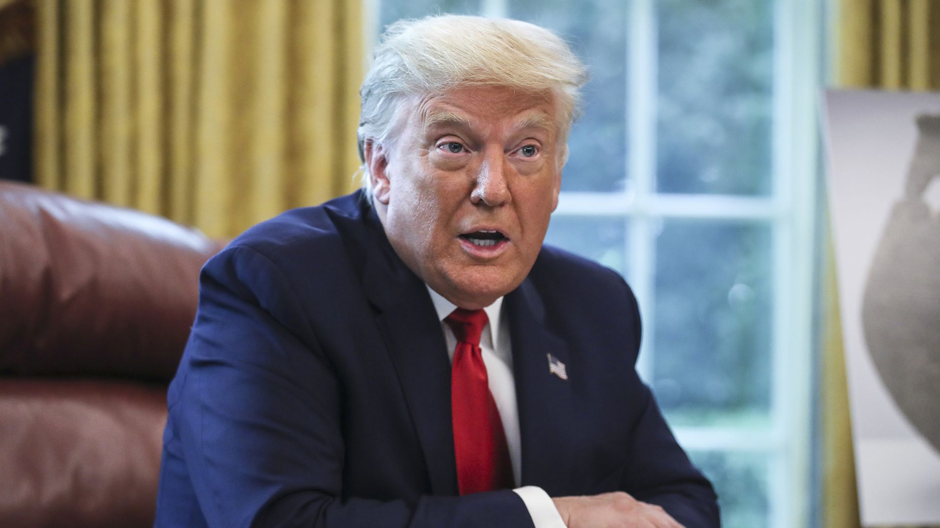 Donald Trump speaks in the Oval Office