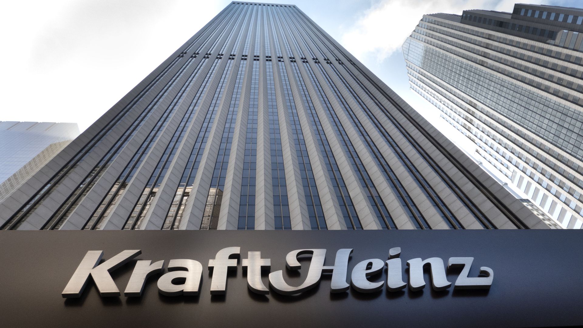 Photo of a tall building with a sign that says "Kraft Heinz" 