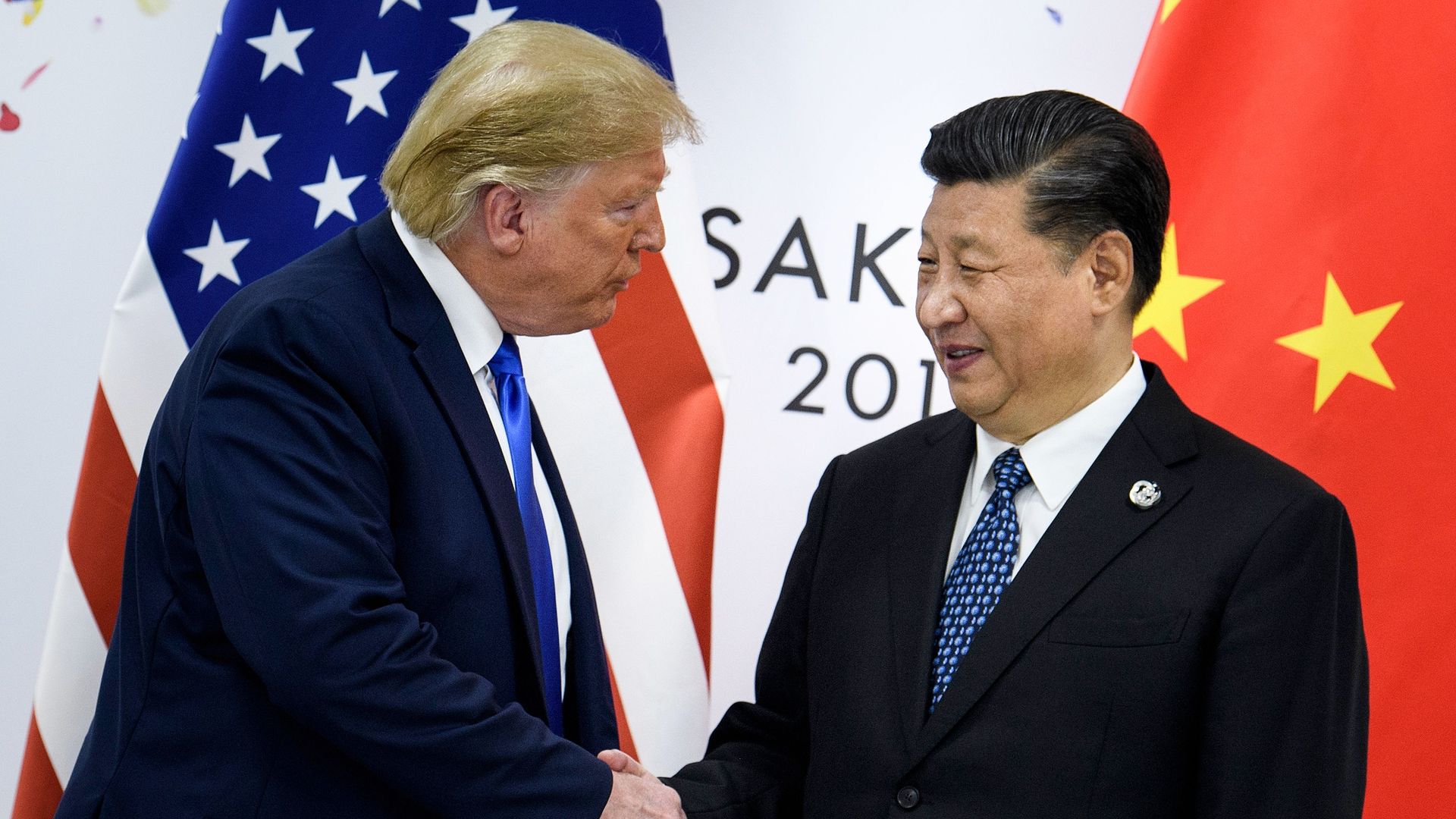 Trump and Chinese President Xi Jingping. Photo: BRENDAN SMIALOWSKI/AFP via Getty Images.