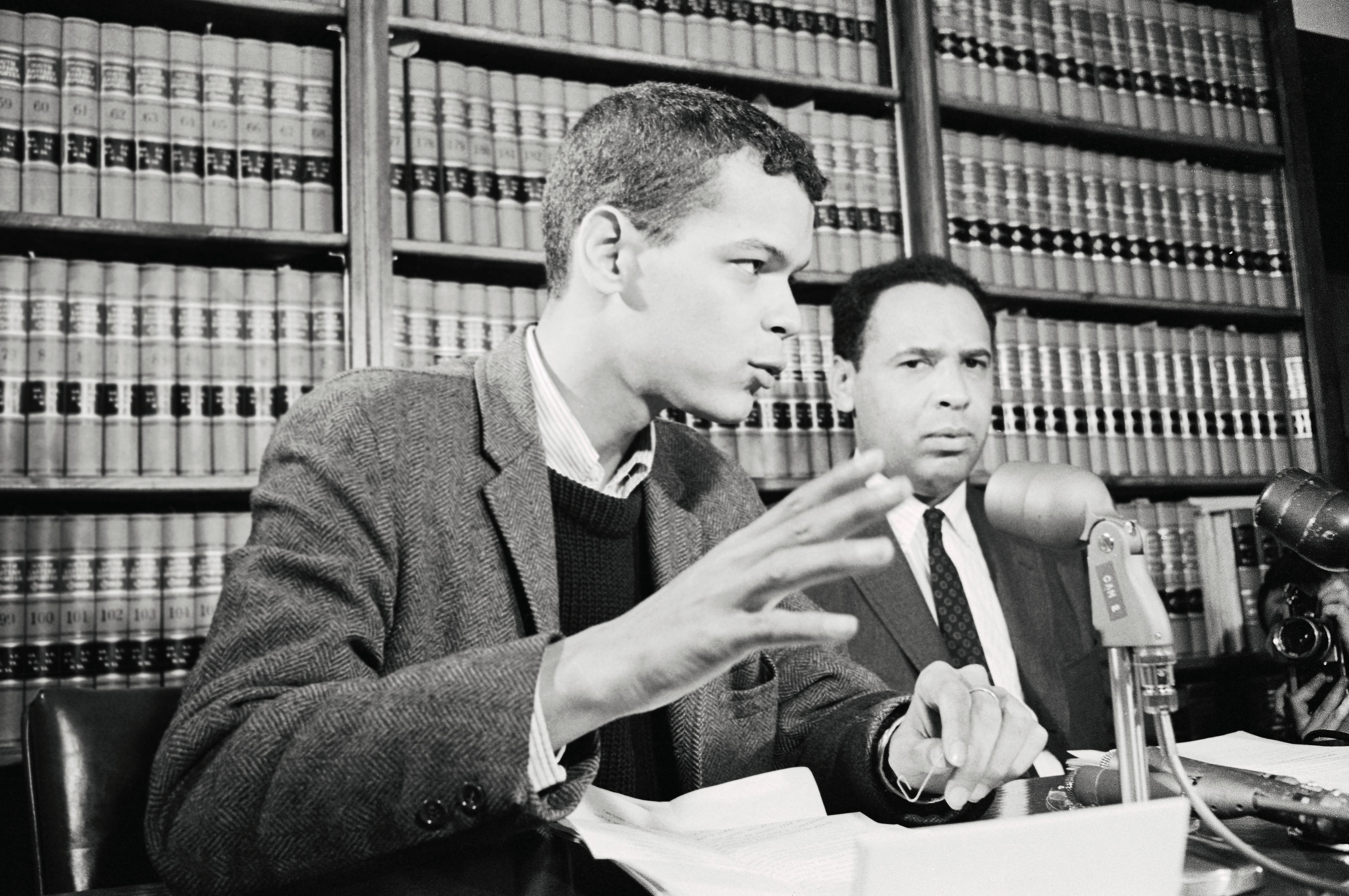 (Original Caption) Black leader Julian Bond, (L), refused his seat in the Georgia House of Representatives because of his anti-Viet Nam War sentiments, and he expressed disappointment with the decision of a three-judge federal court upholding right of state legislature to judge its members' qualifications. Bond and his attorney, Howard Moore, vowed to appeal the decision to the U.S. Supreme Court.