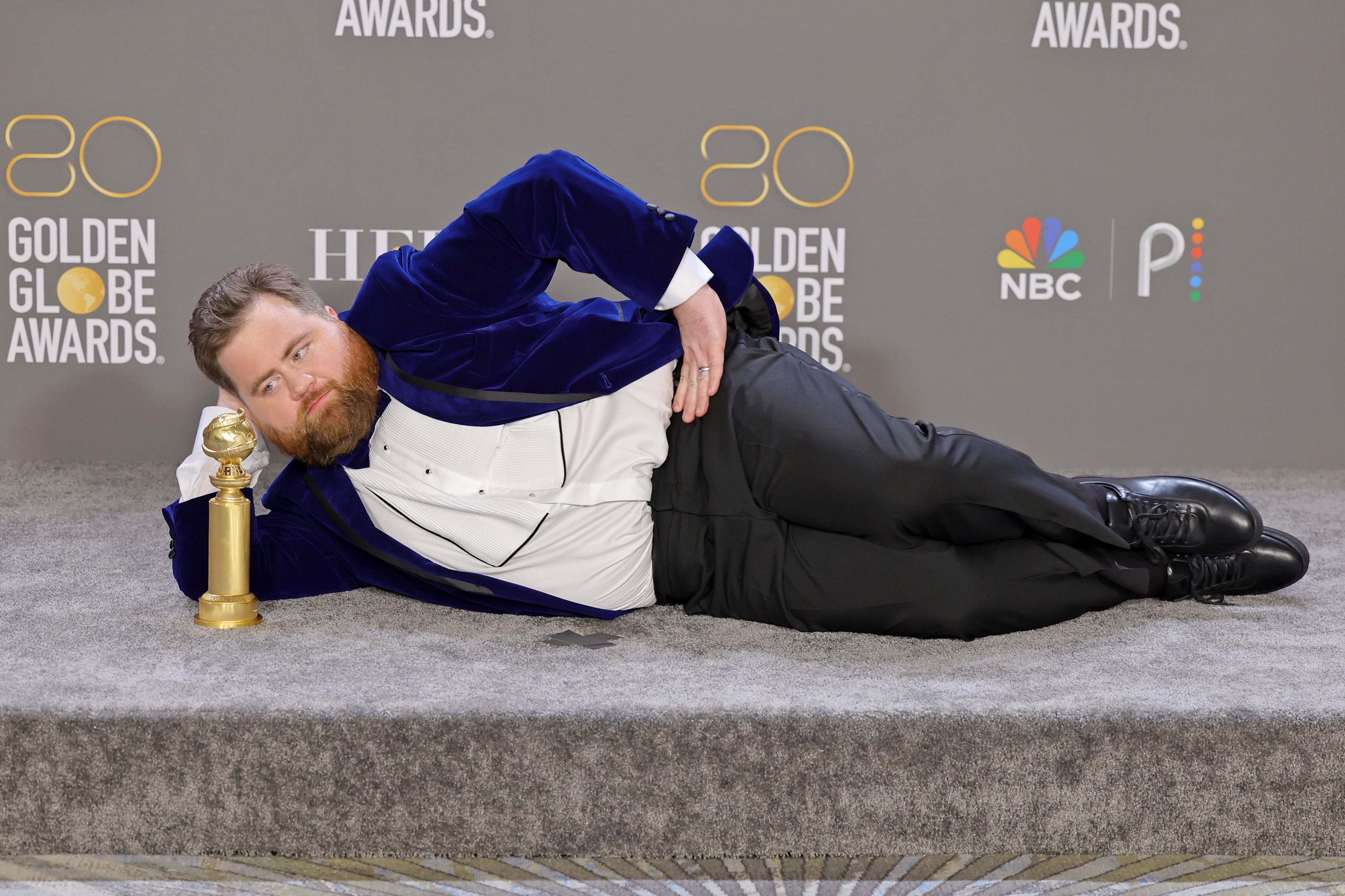 Paul Walter Hauser poses with the Best Performance in a Limited or Anthology Series or Television Film award for "Black Bird"  during the Globe Awards January 10, 2023 in Beverly Hills.