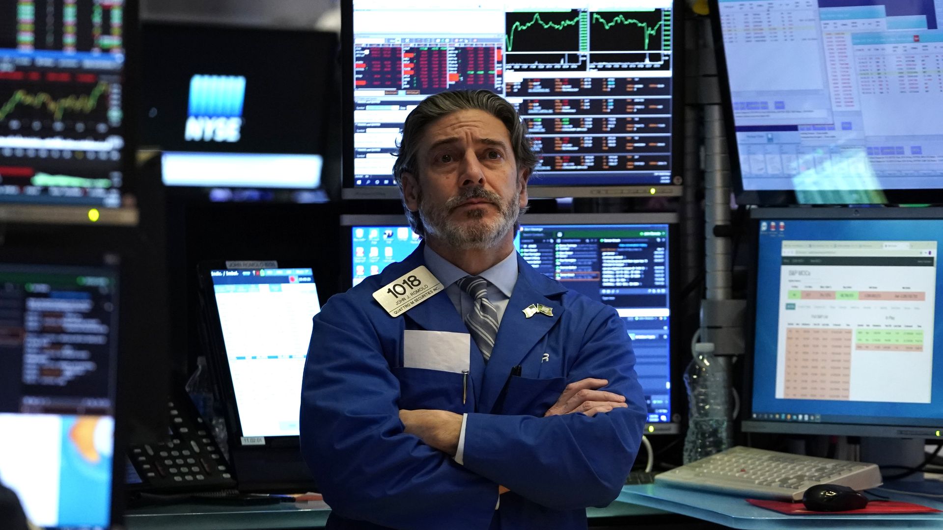 Trader standing at the New York Stock exchange
