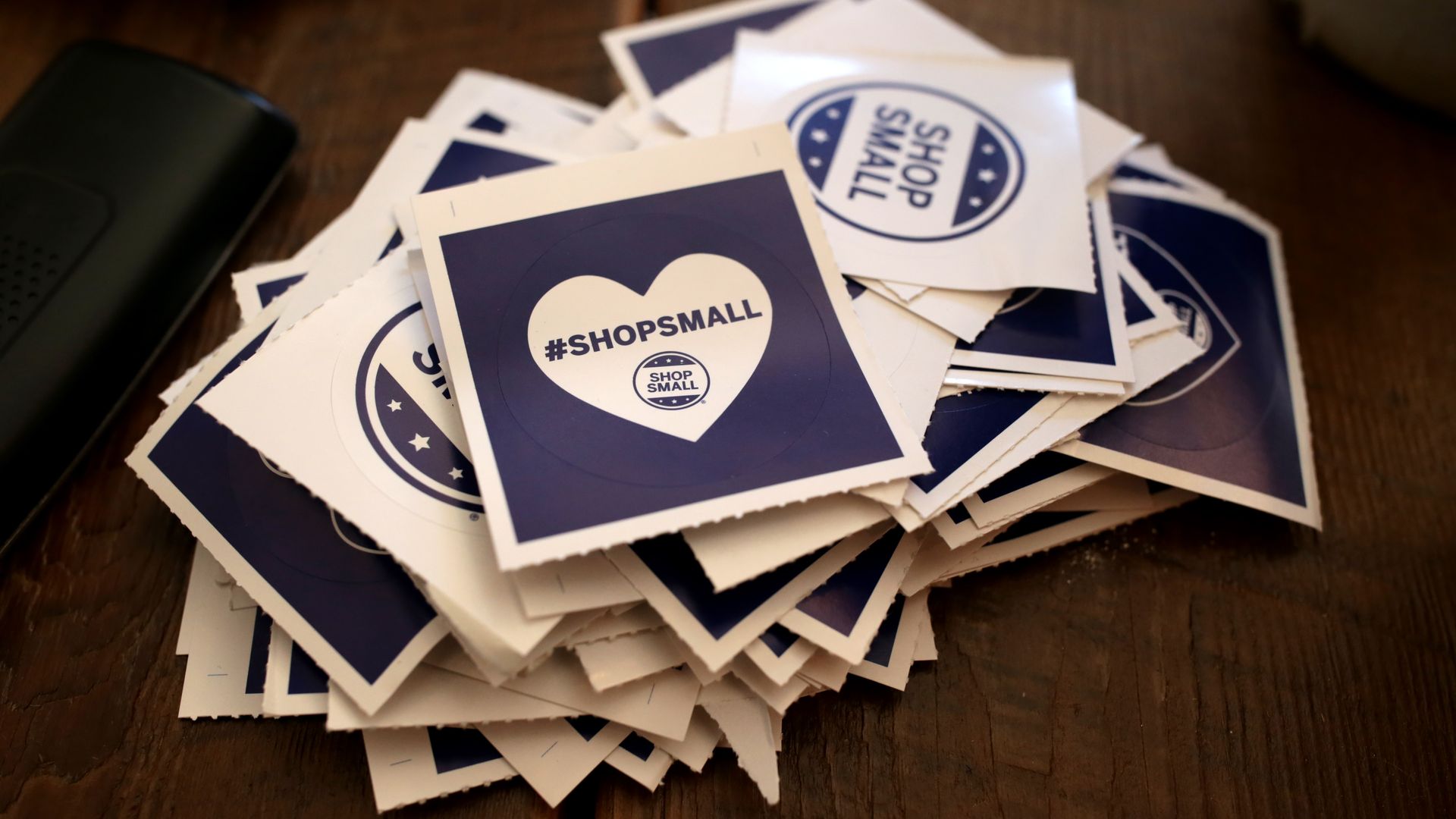 BROOKLINE, MA - NOVEMBER 25: #ShopSmall stickers are pictured at the Boston General Store in Coolidge Corner in Brookline, MA on Small Business Saturday