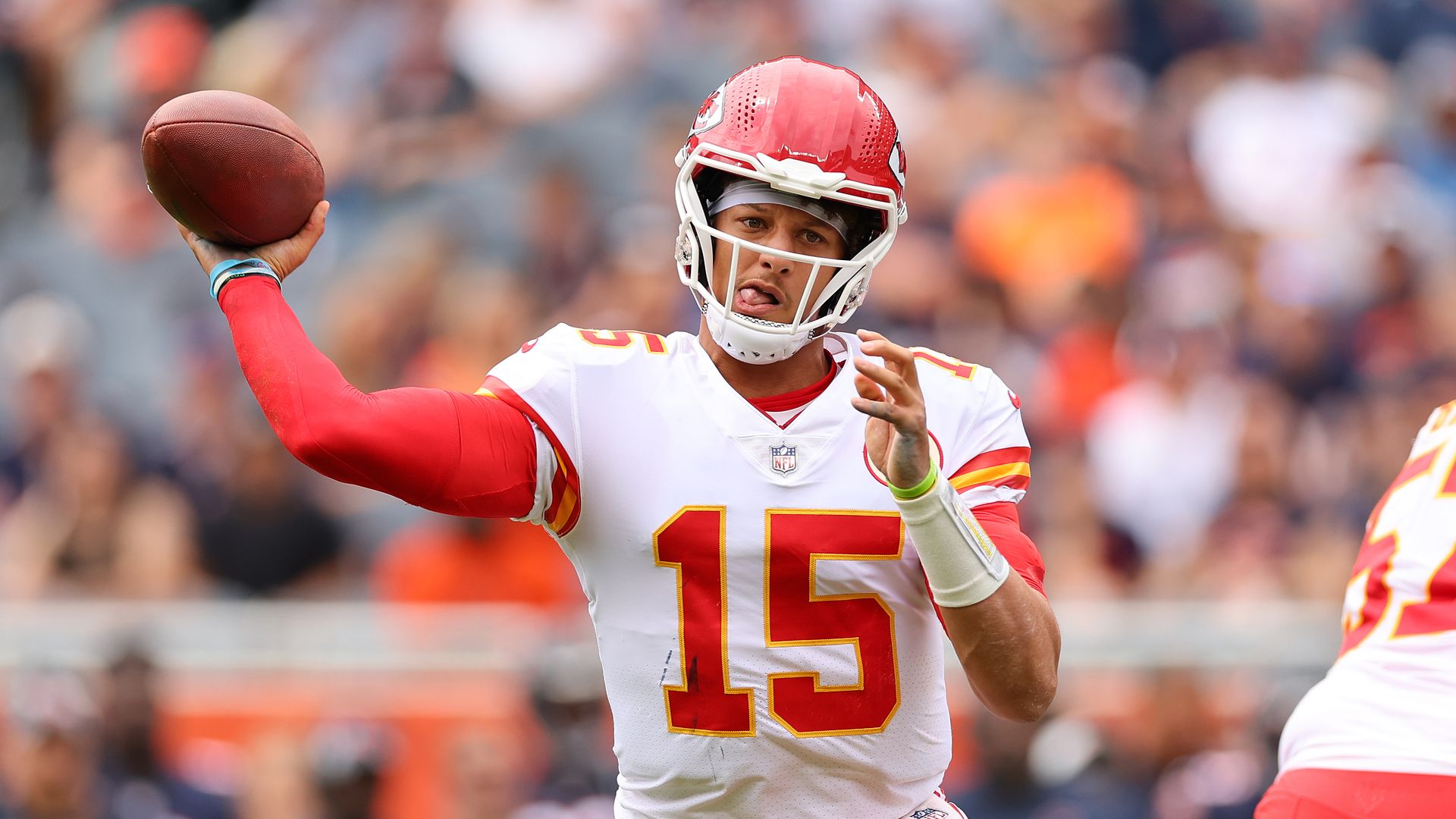 Patrick Mahomes passing the football in an NFL game