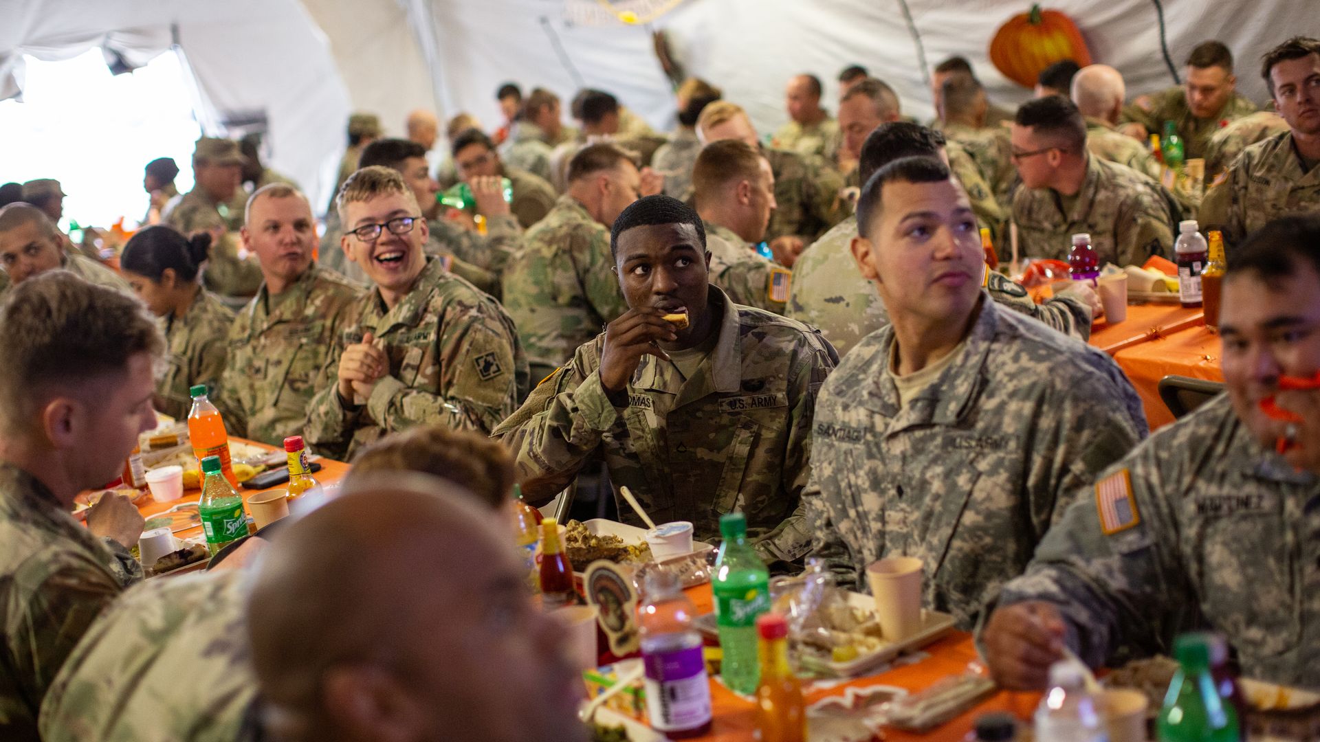 Troops eat Thanksgiving meal at southern border.