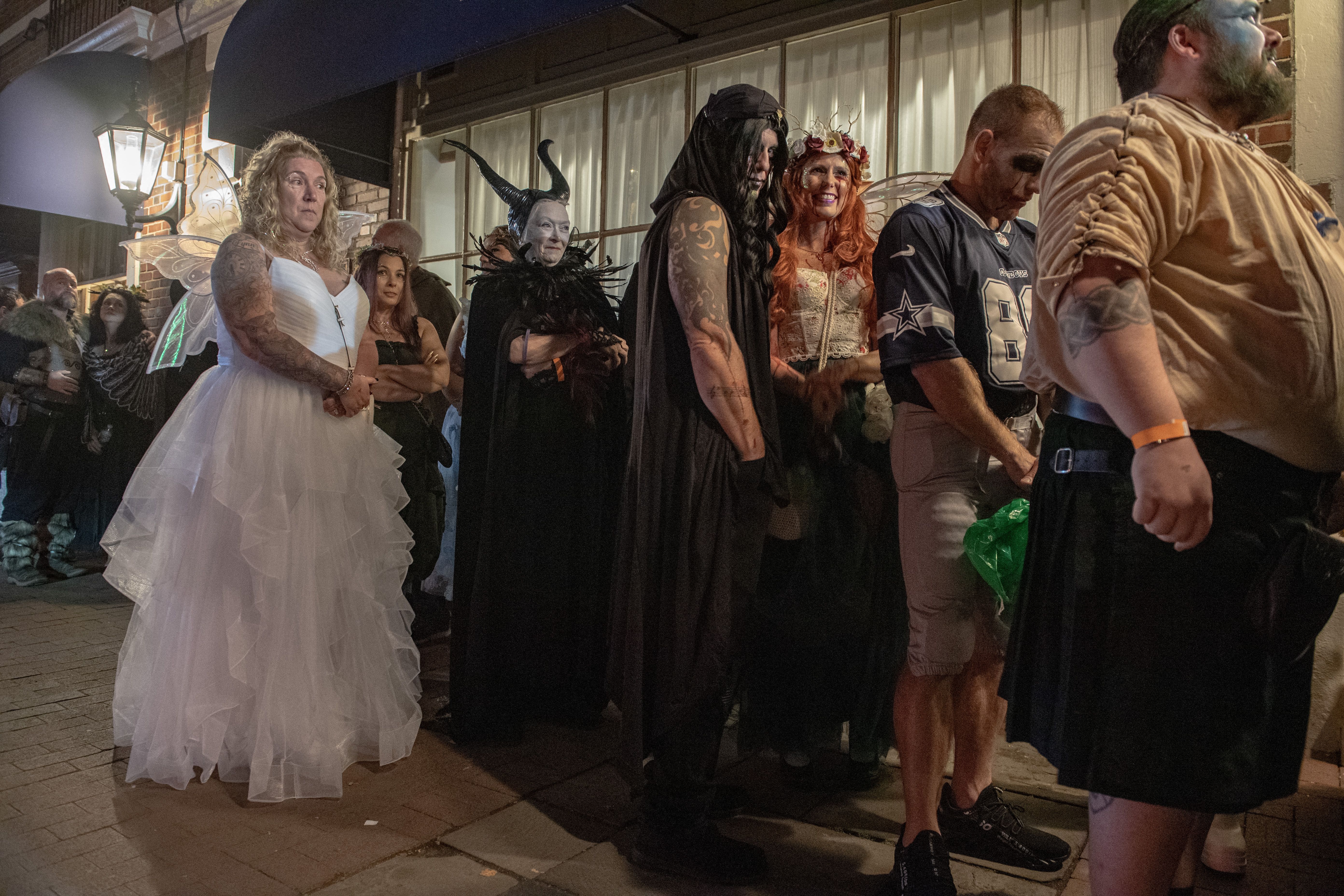 Revellers take part in the Salem Witches' Halloween Ball 2024, in Salem, Massachusetts, on October 25, 2024. 