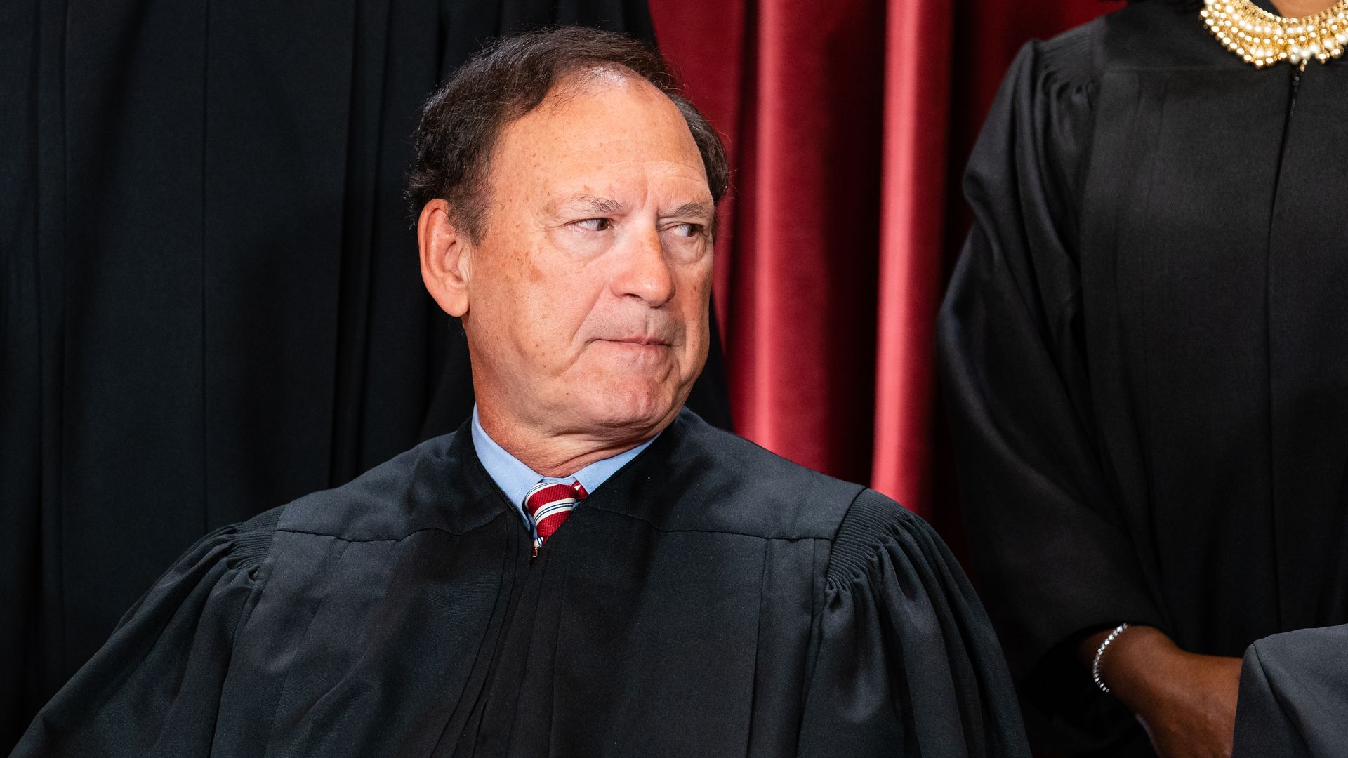 Supreme Court Justice Samuel Alito, wearing his robes and sitting with his colleagues.