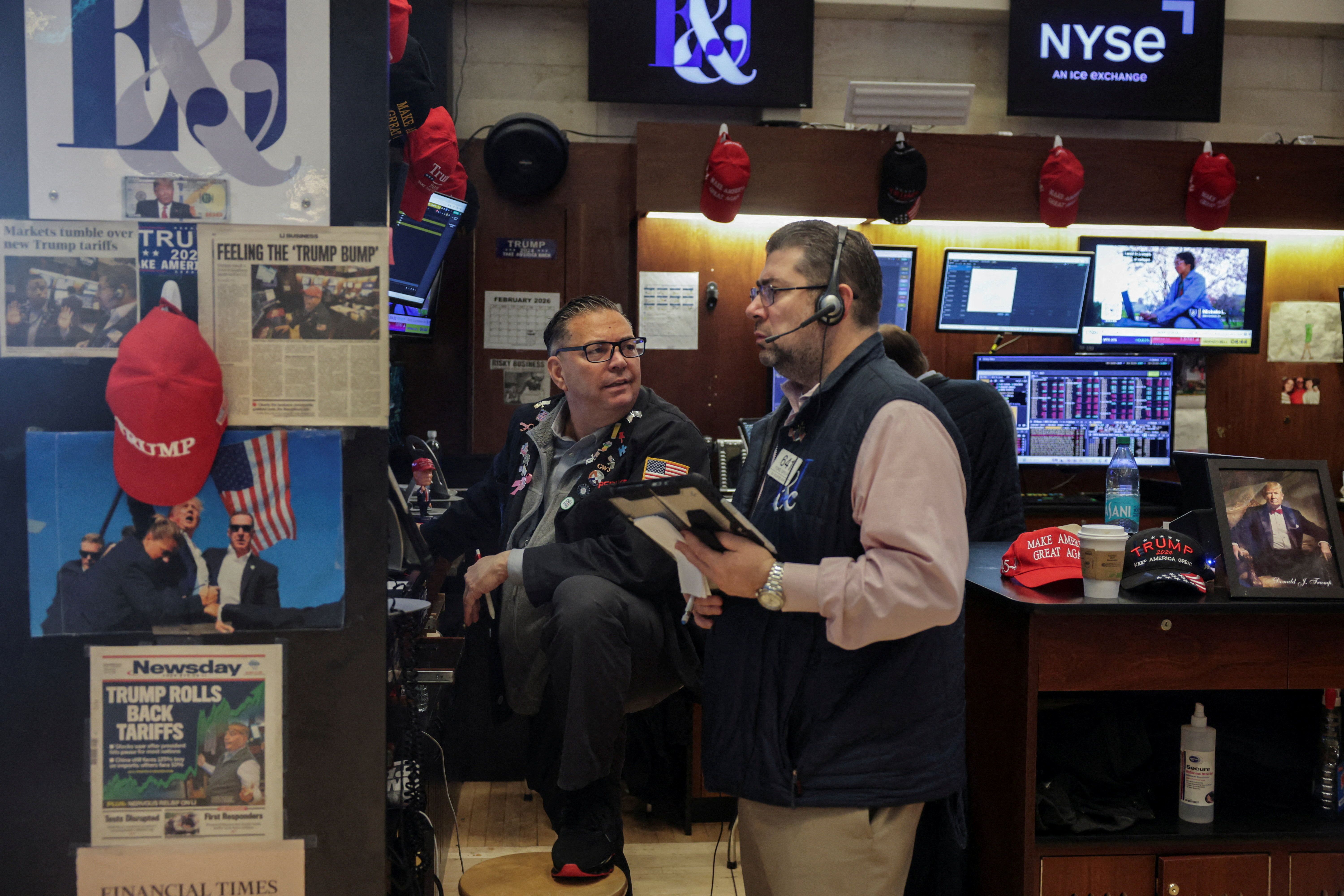 Traders work on the floor of the New York Stock Exchange in February. Photo: Jeenah Moon/Reuters