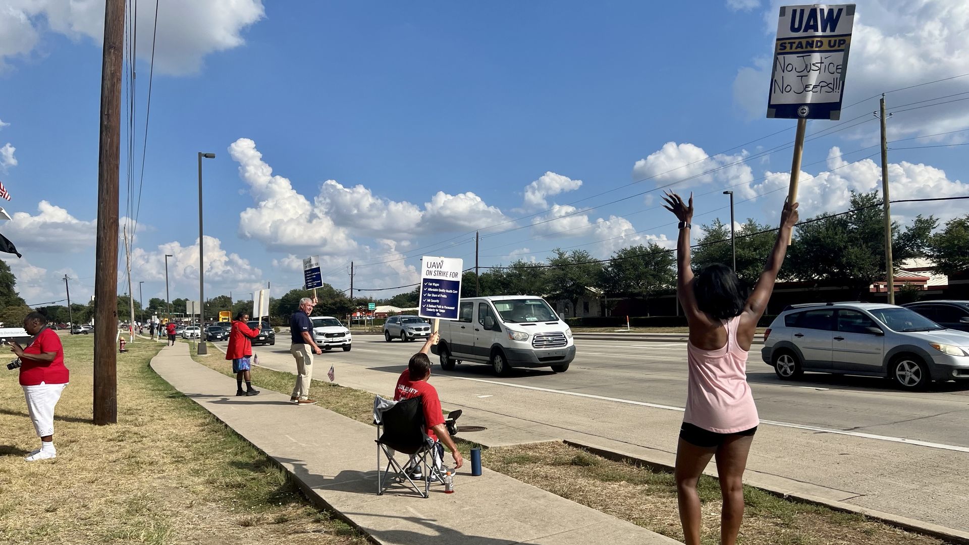 a photo of car plant workers on strike in Carrollton