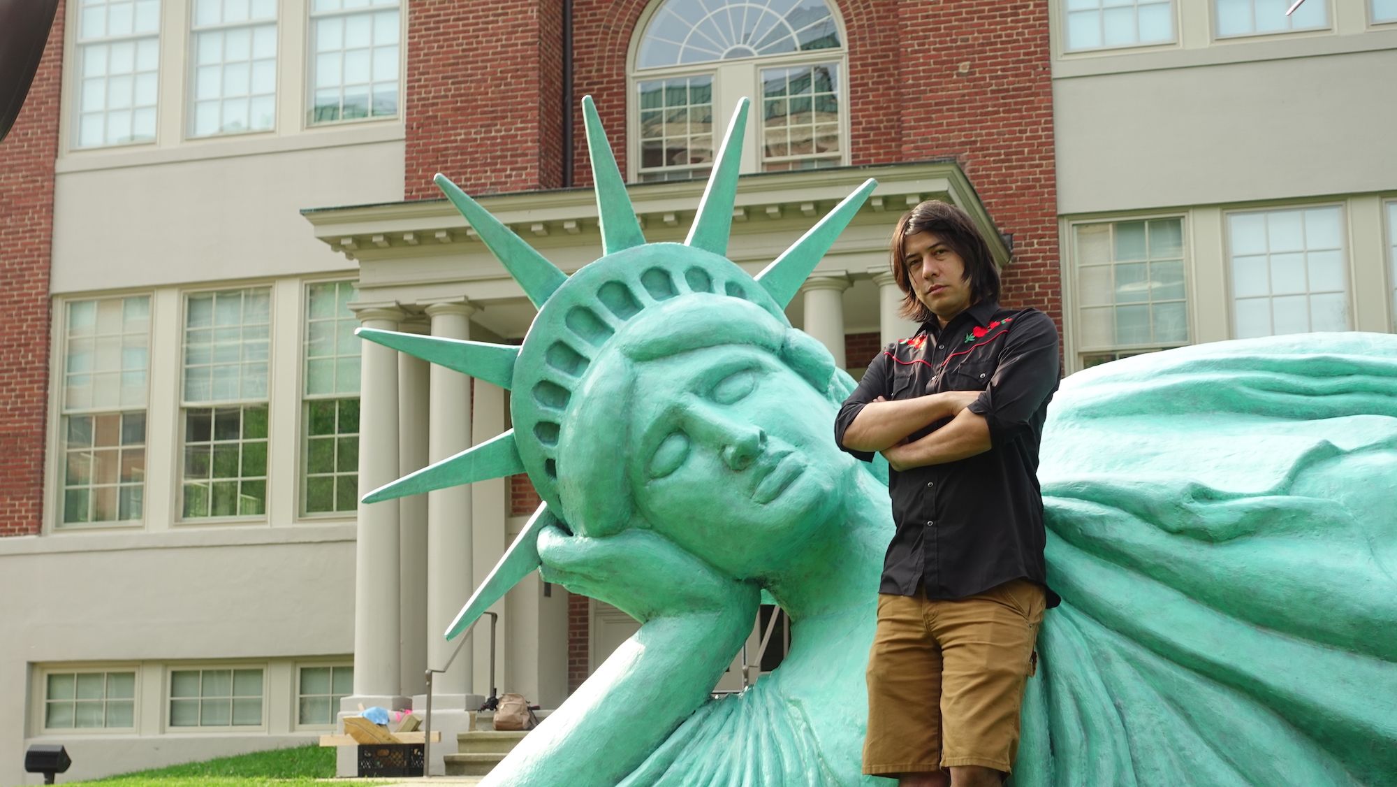 Artist Zaq Landsberg with Reclining Liberty. Photo: MoCA Arlington