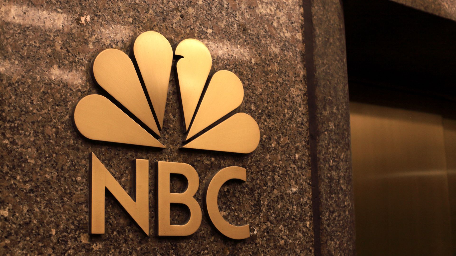 NBC logo on wall of Rockefeller Center in New York City.