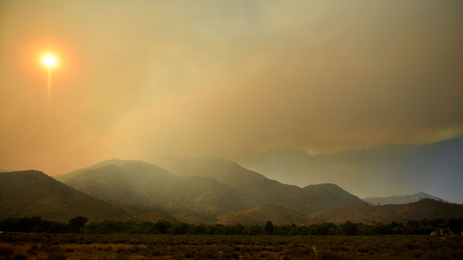 Wildfire smoke hangs over Lake Isabella during the French Fire in the Sequoia National Forest.