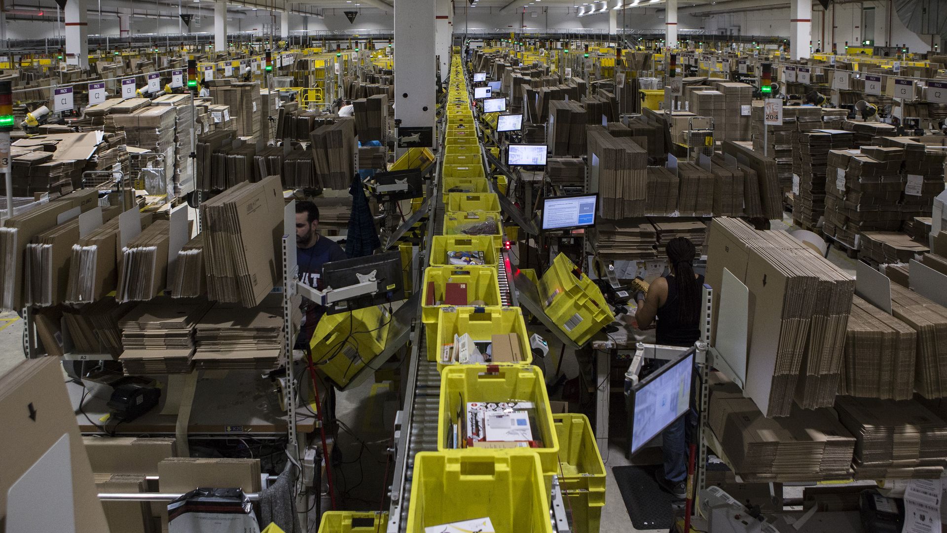 An assembly line of boxes in a warehouse