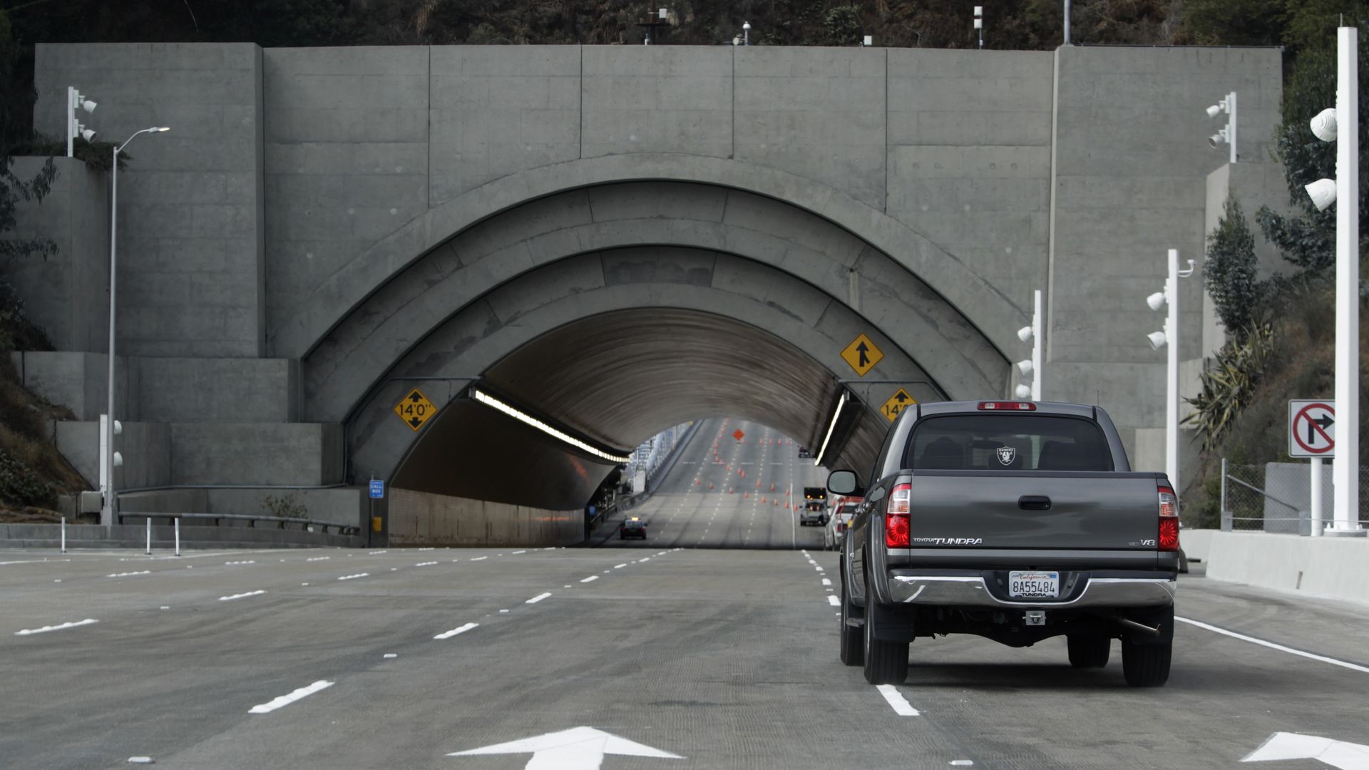 Westbound lanes of the new eastern Bay Bridge lead directly into the Yerba Buena Island tunnel as construction crews finish work on the new span of in San Francisco, Calif. on Monday, Sept. 2, 2013. Caltrans expects to open the bridge to commuters on Tuesday at 5 a.m., but may possibly open it sever