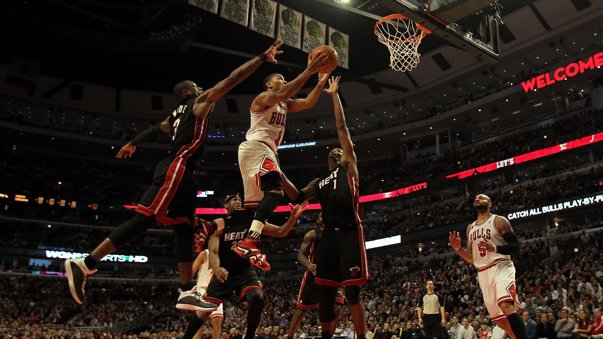 Photo of basketball players on the court. 