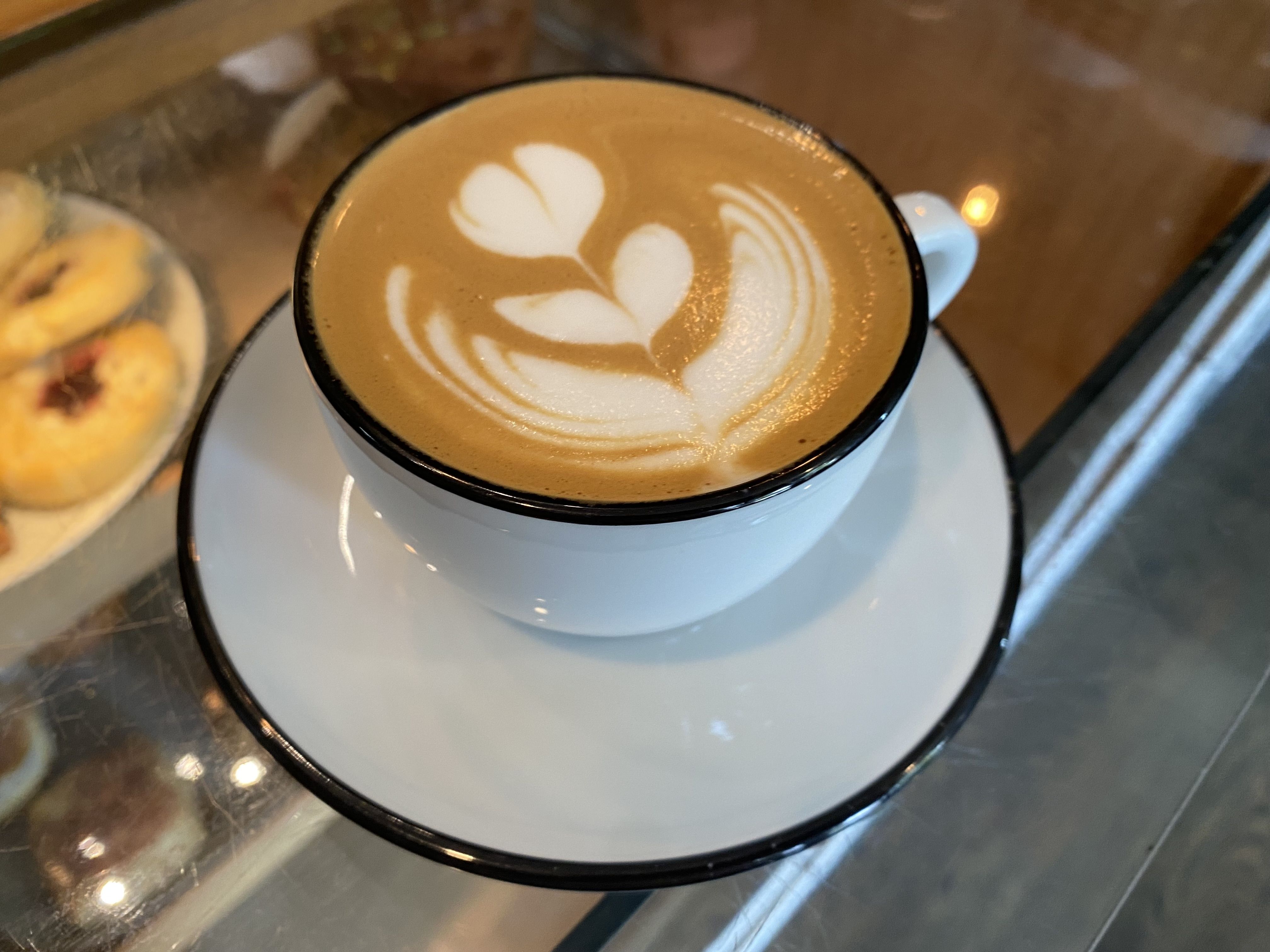 QED Coffee offers smooth cappuccinos and cool vibe - Axios Seattle