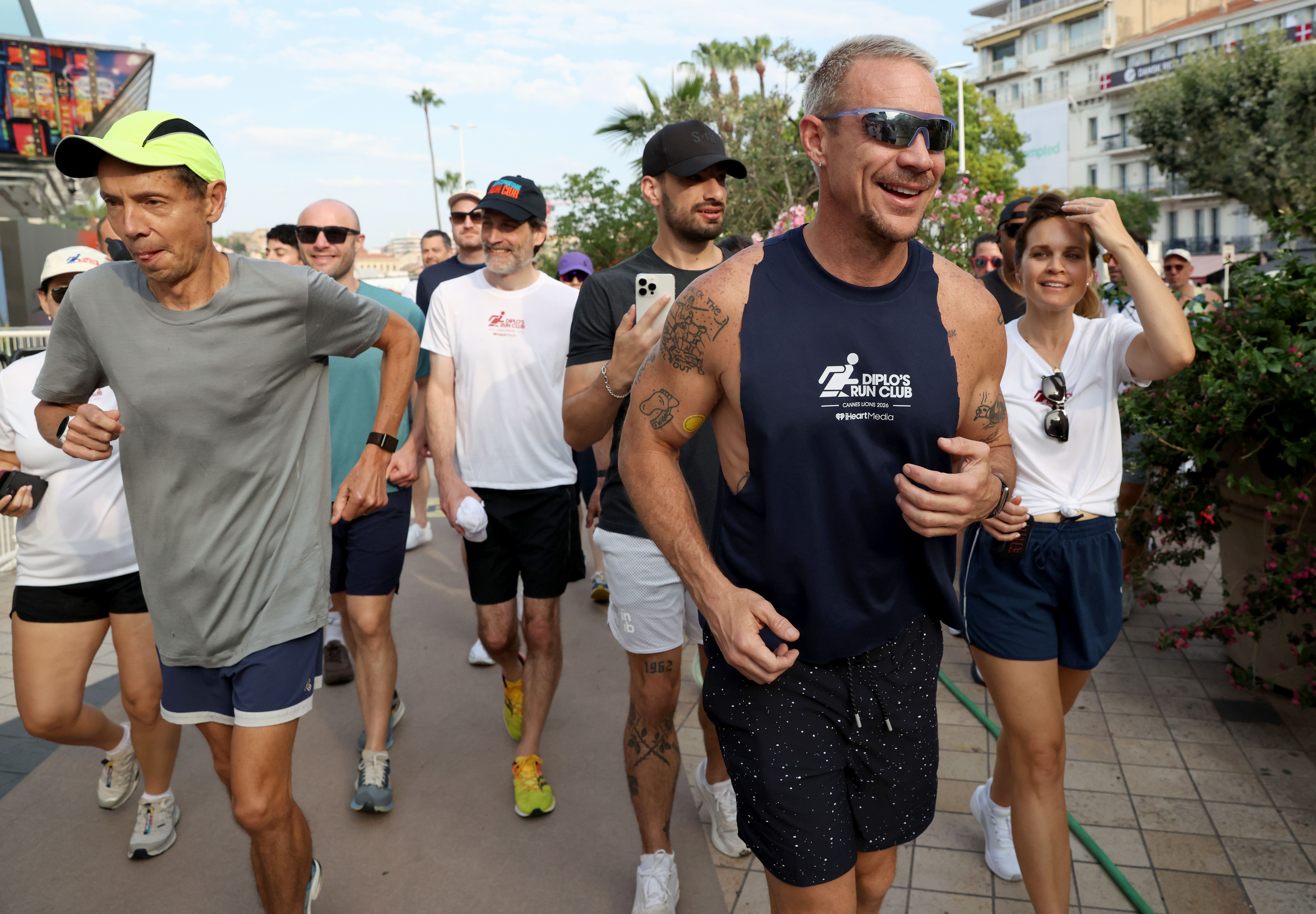 Author Malcolm Gladwell (L) and Diplo, DJ and record producer, participate in the iHeartMedia three-mile Run Club and Recovery session during the Cannes Lions Festival on June 24, 2026.