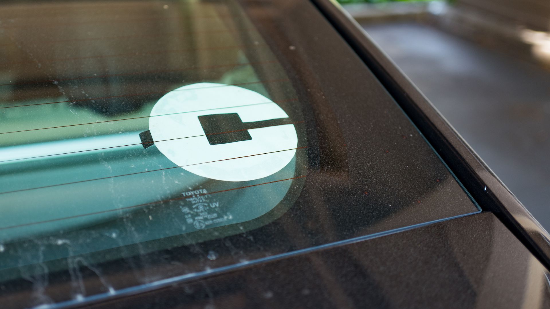 An Uber logo on a car