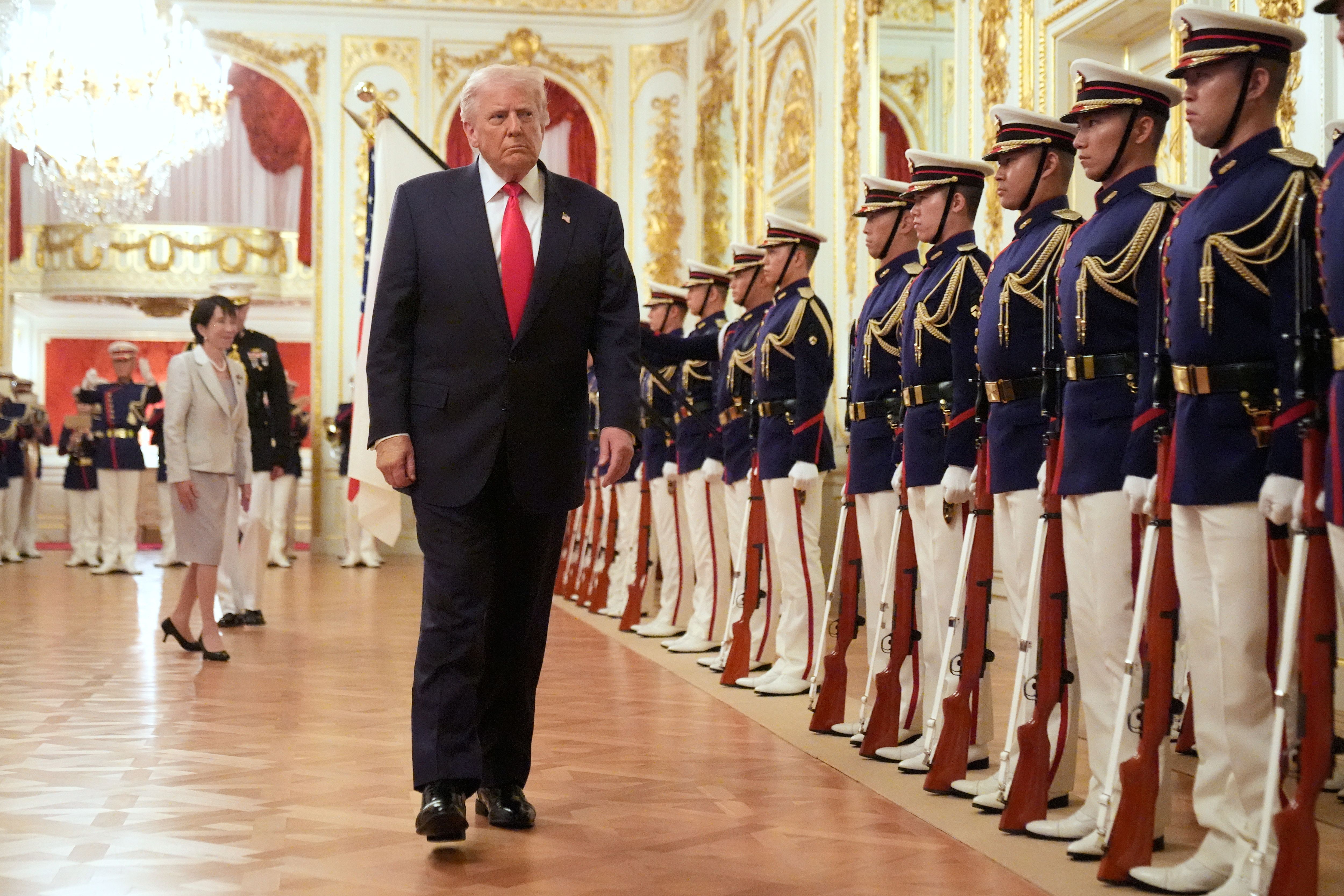 President Trump and Japanese Prime Minister Sanae Takaichi review an honor guard at Akasaka Palace in Tokyo this morning.