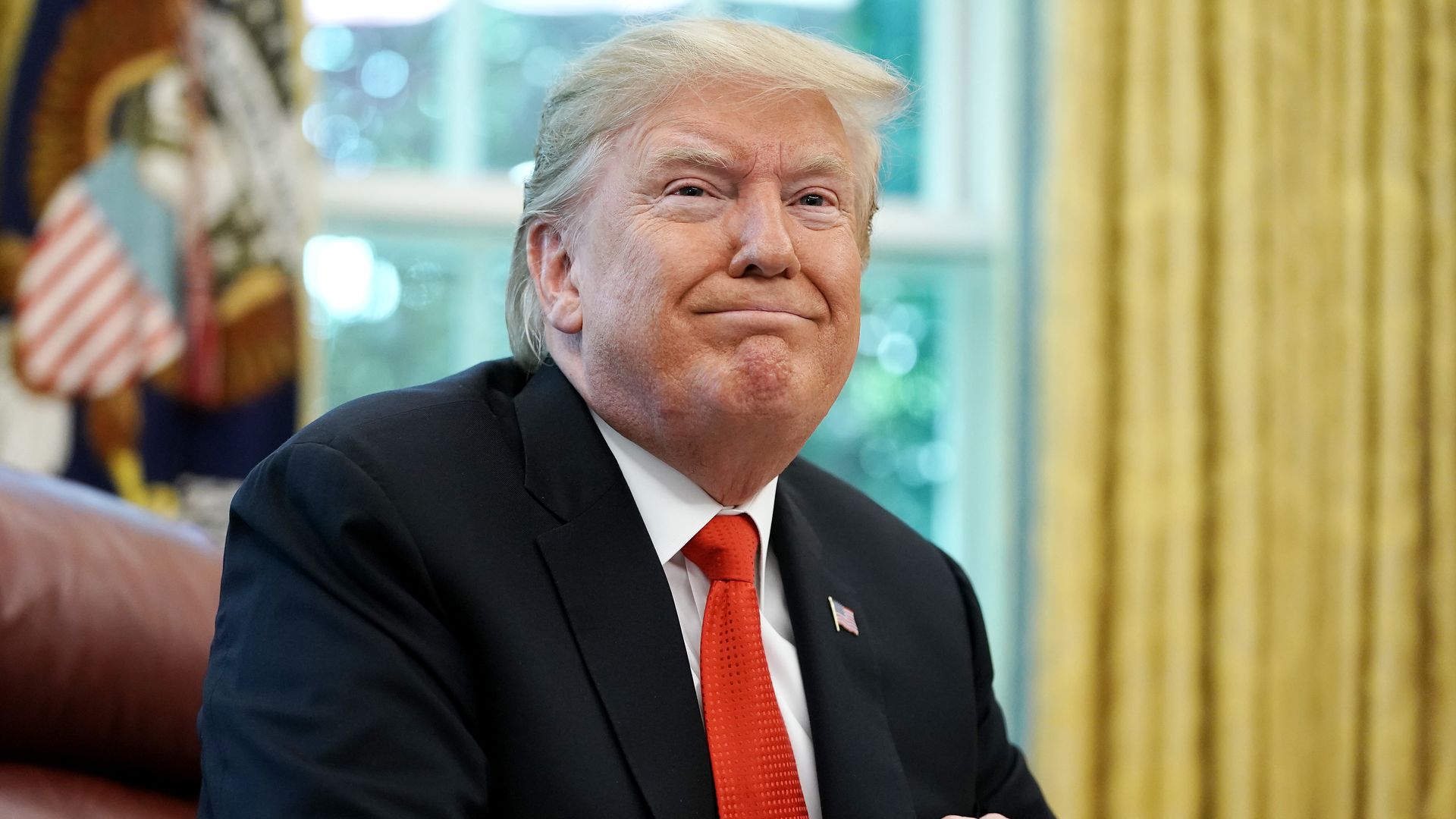 Photo of President Trump in the Oval Office.