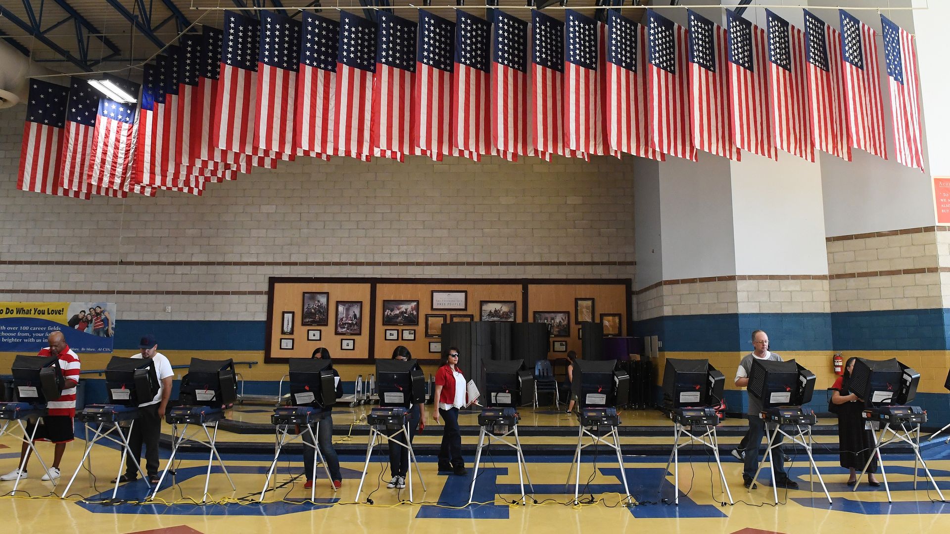 Voters cast their ballots at voting machines at Cheyenne High School on Election Day on November 8, 2016 in North Las Vegas, Nevada. 
