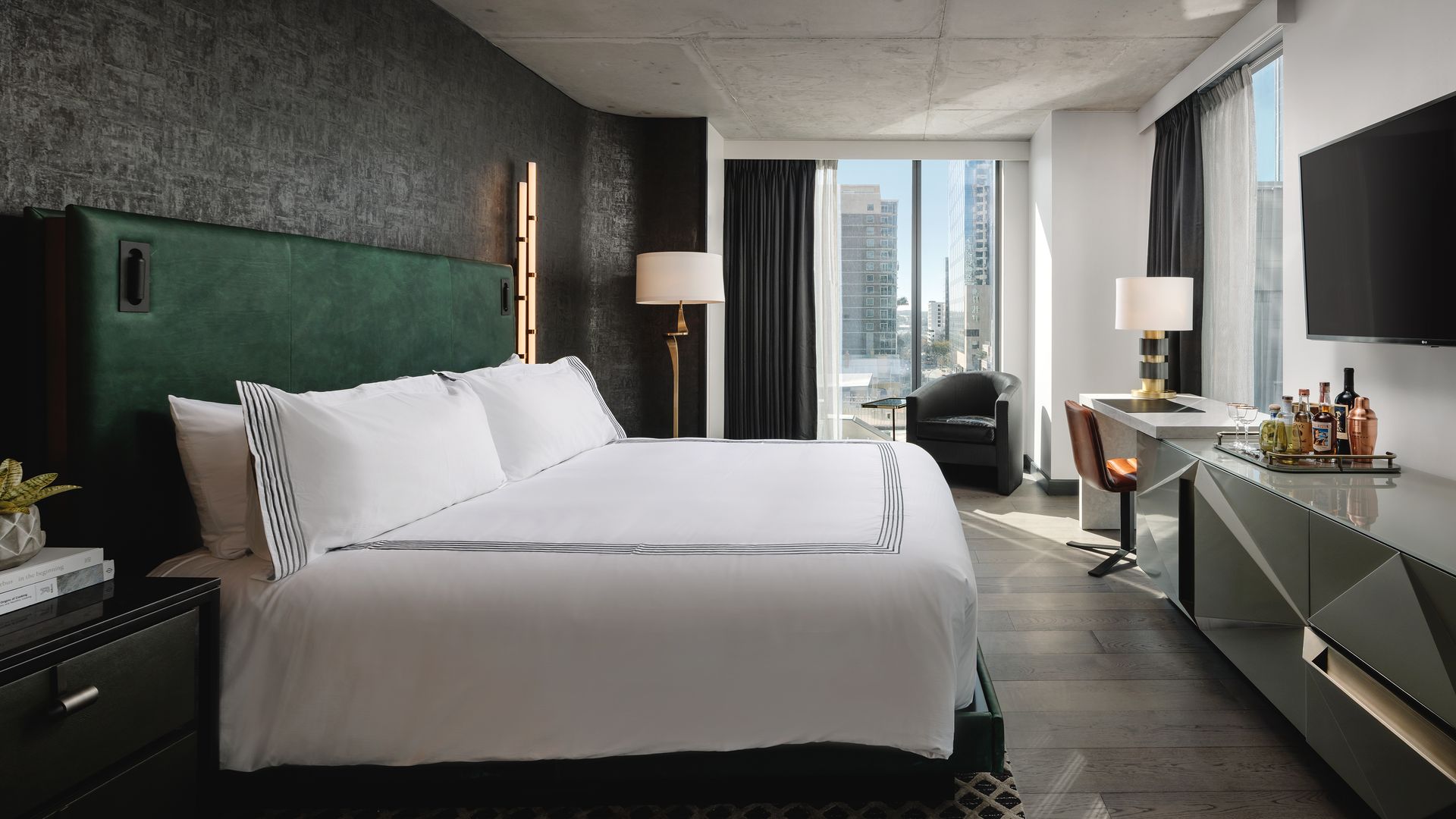 A photo of a bed in a hotel room.