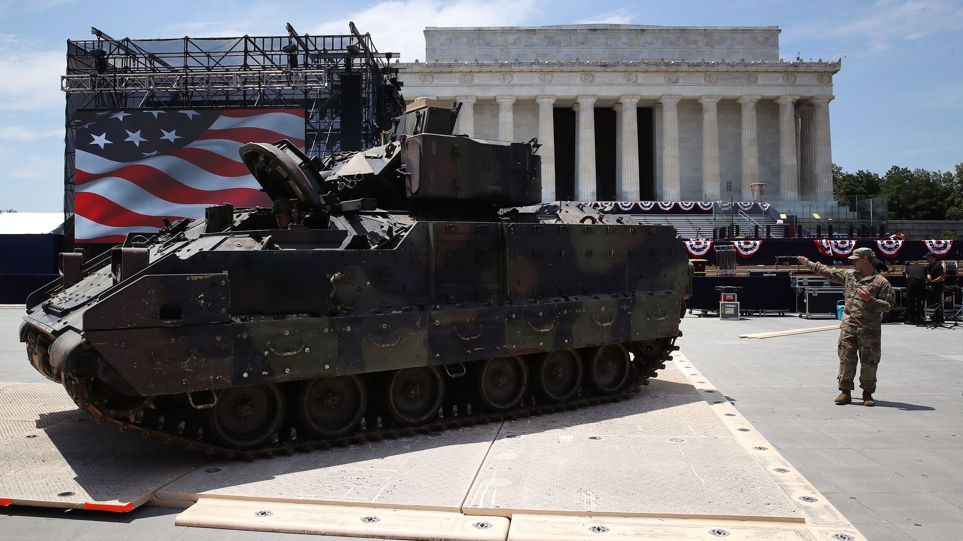 Members of the U.S. Army park an M1 Abrams tank in front of the Lincoln Memorial.