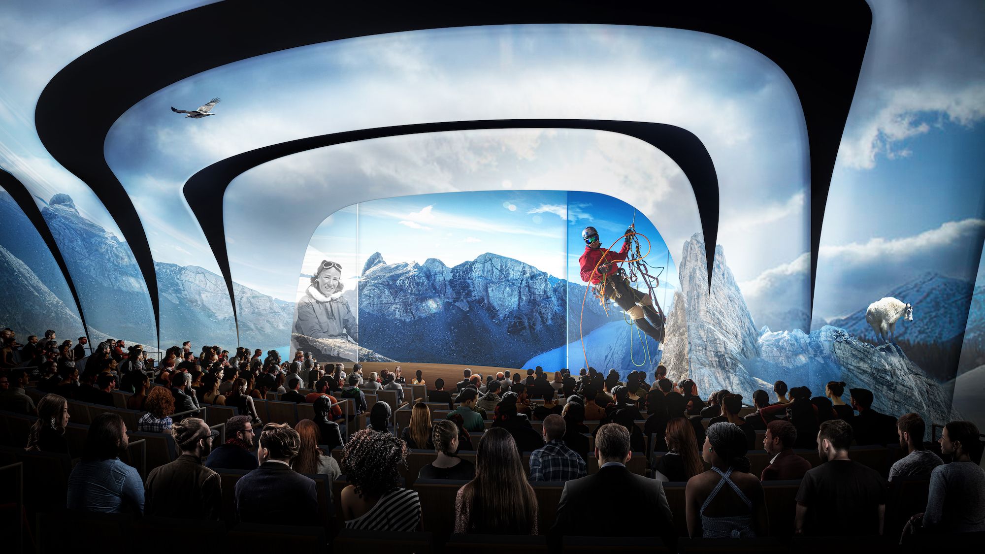 A futuristic theater filled with an audience watches a mountain-climbing scene projected through curved, window-like panels; outside, towering peaks, a climber, a sheep on a rock, and a blue sky.