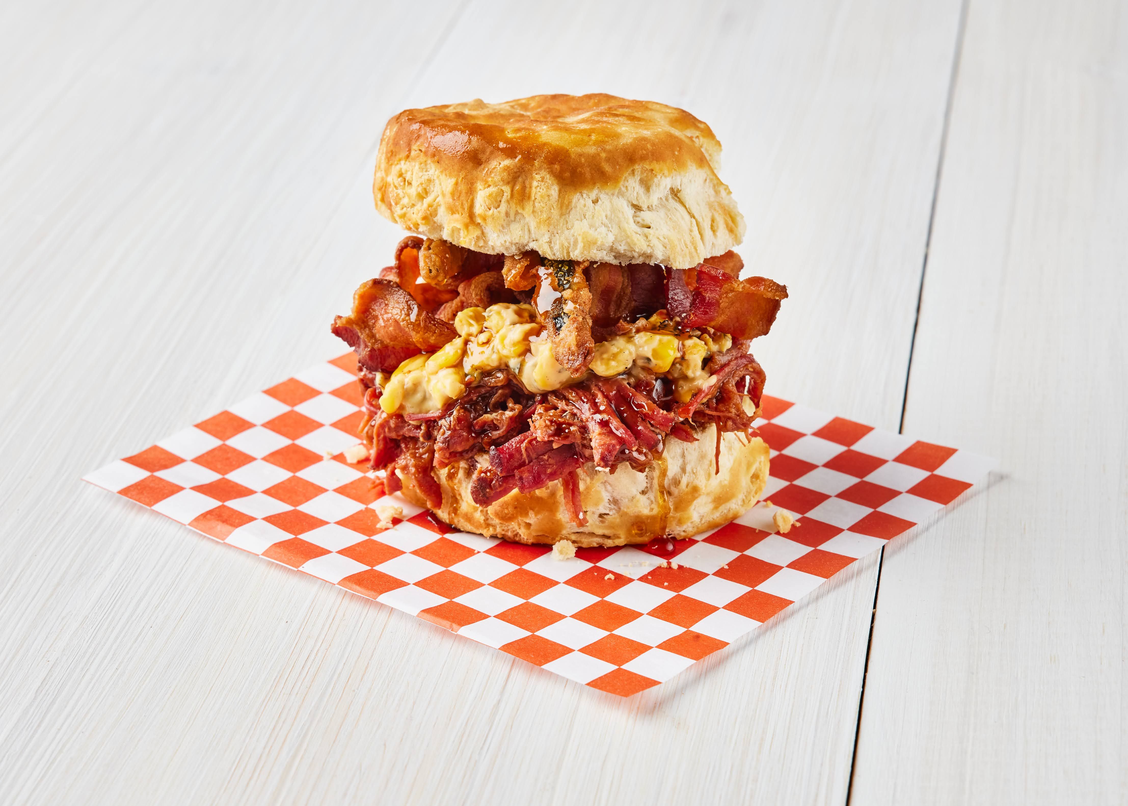 A biscuit filled with bacon and cheese
