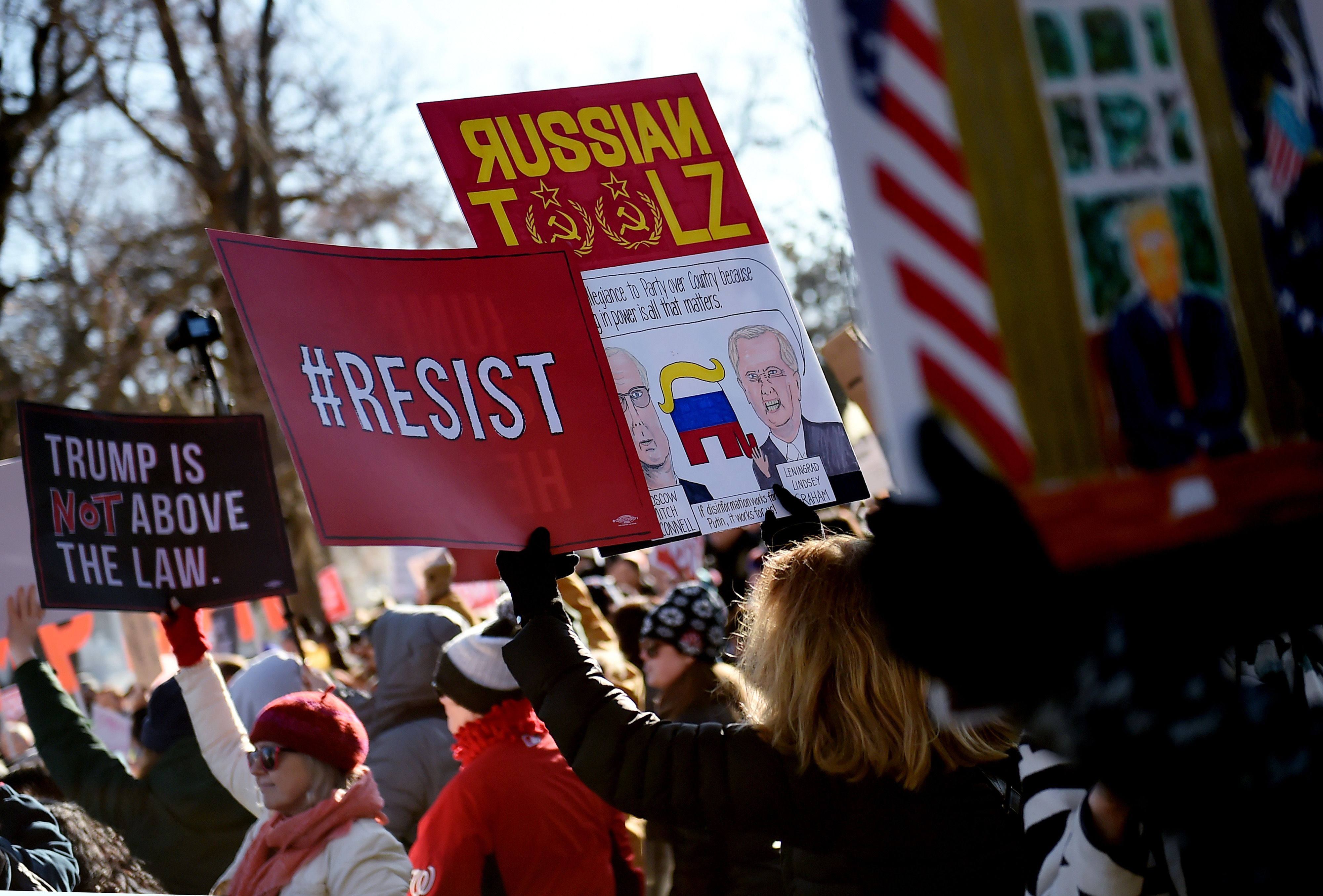 People rally in support of the impeachment of US President Donald Trump in front of the US Capitol