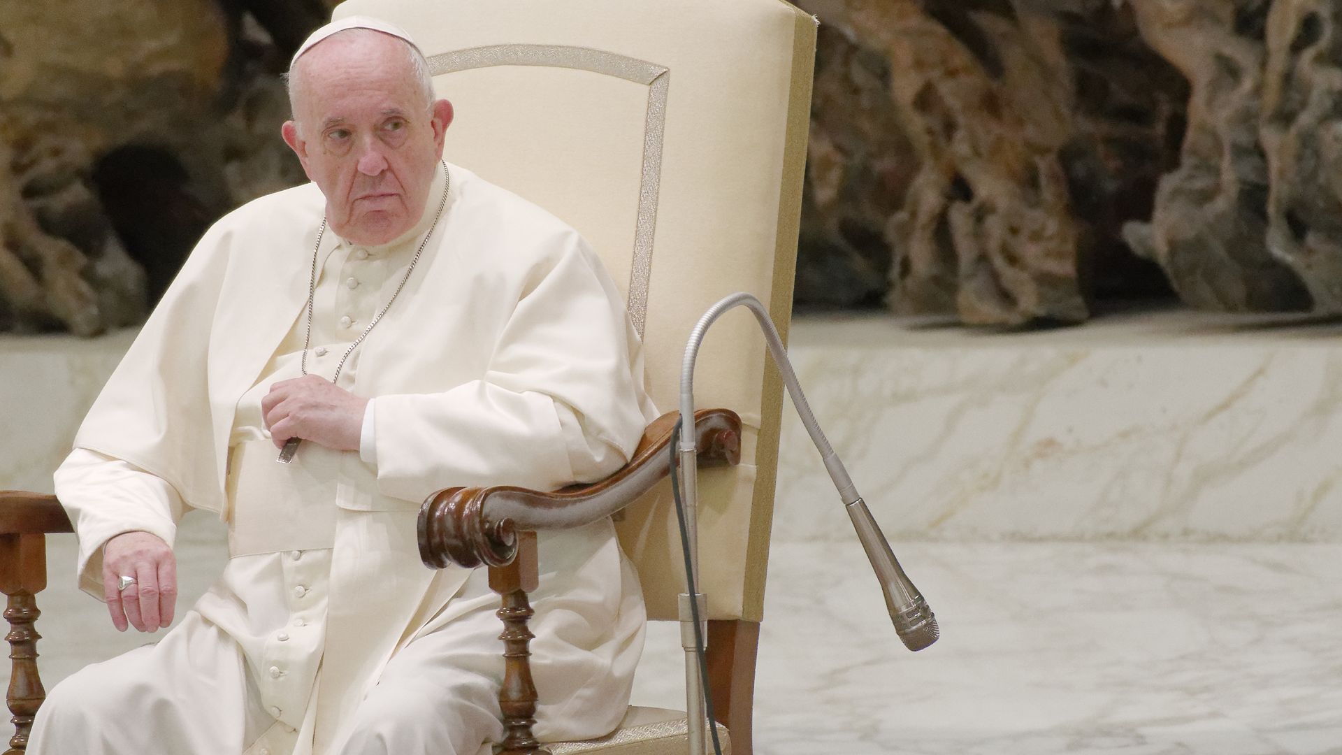 Pop Francis sitting down.