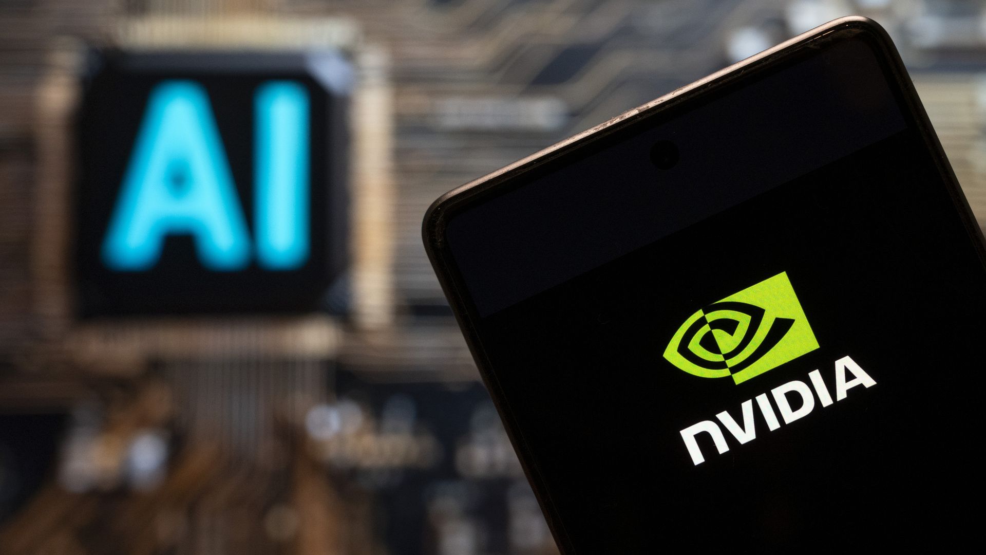 An Nvidia logo displayed on a smartphone with Artificial intelligence (AI) chip and symbol in the background