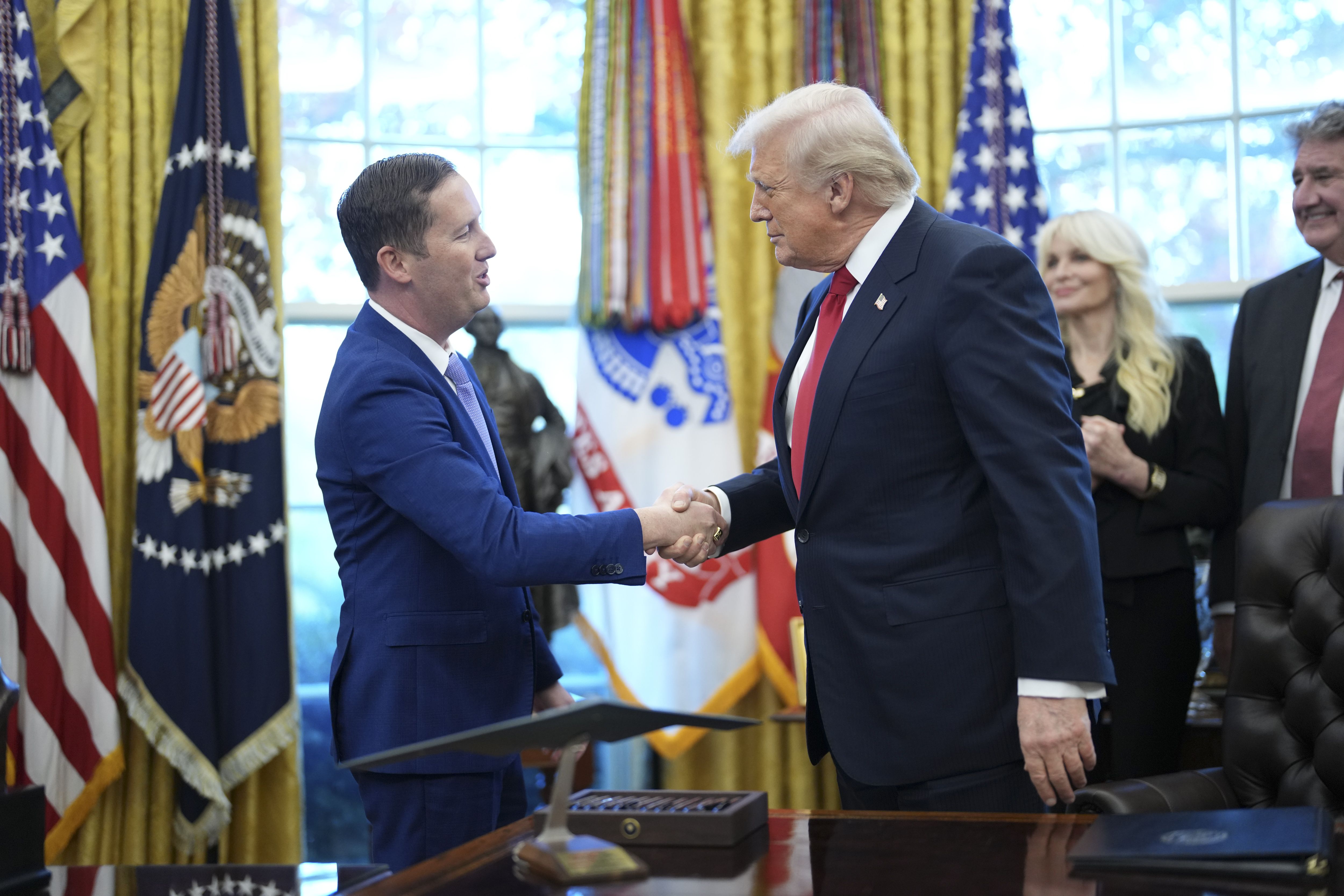 President Donald Trump shakes hands with Sergio Gor during his swearing-in ceremony as U.S. ambassador to India at the White House in Washington, on Monday, Nov. 10, 2025. (Doug Mills/The New York Times)